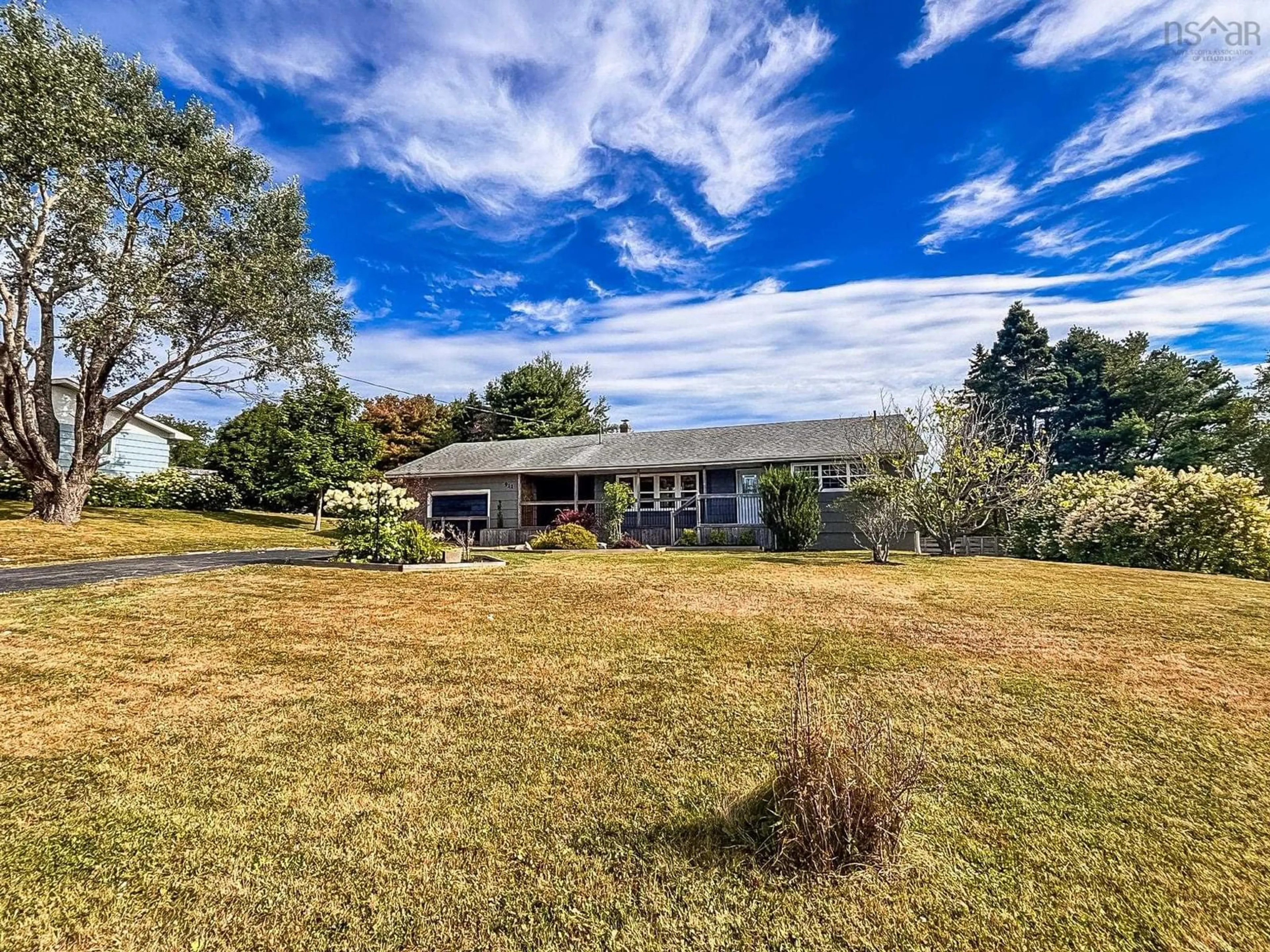A pic from outside/outdoor area/front of a property/back of a property/a pic from drone, water/lake/river/ocean view for 911 Blue Rocks Rd, Garden Lots Nova Scotia B0J 2C0