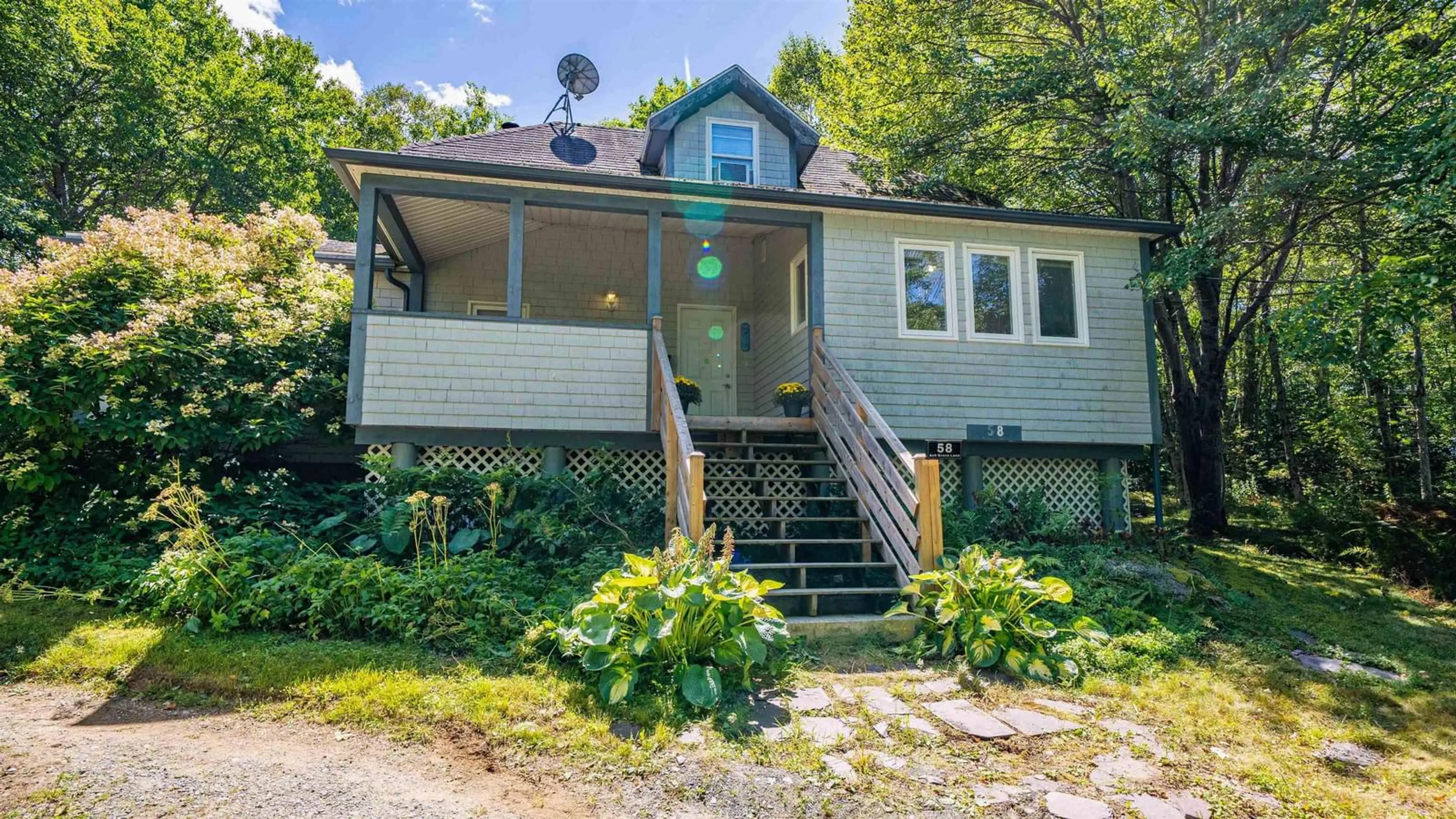 Home with vinyl exterior material, street for 58 Ash Grove Lane, Timberlea Nova Scotia B3T 2J9