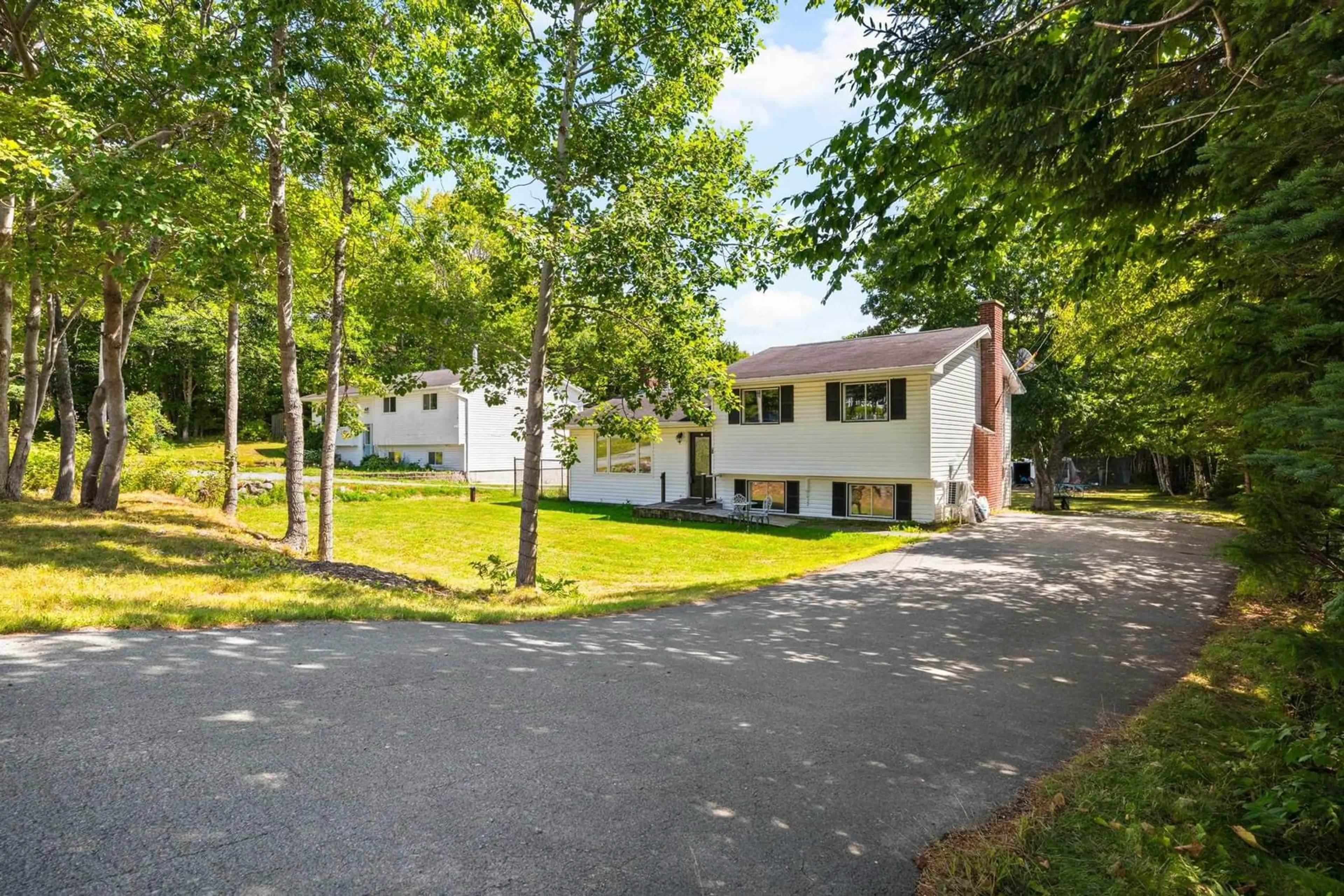 A pic from outside/outdoor area/front of a property/back of a property/a pic from drone, street for 7660 Highway 7, Musquodoboit Harbour Nova Scotia B0J 2L0
