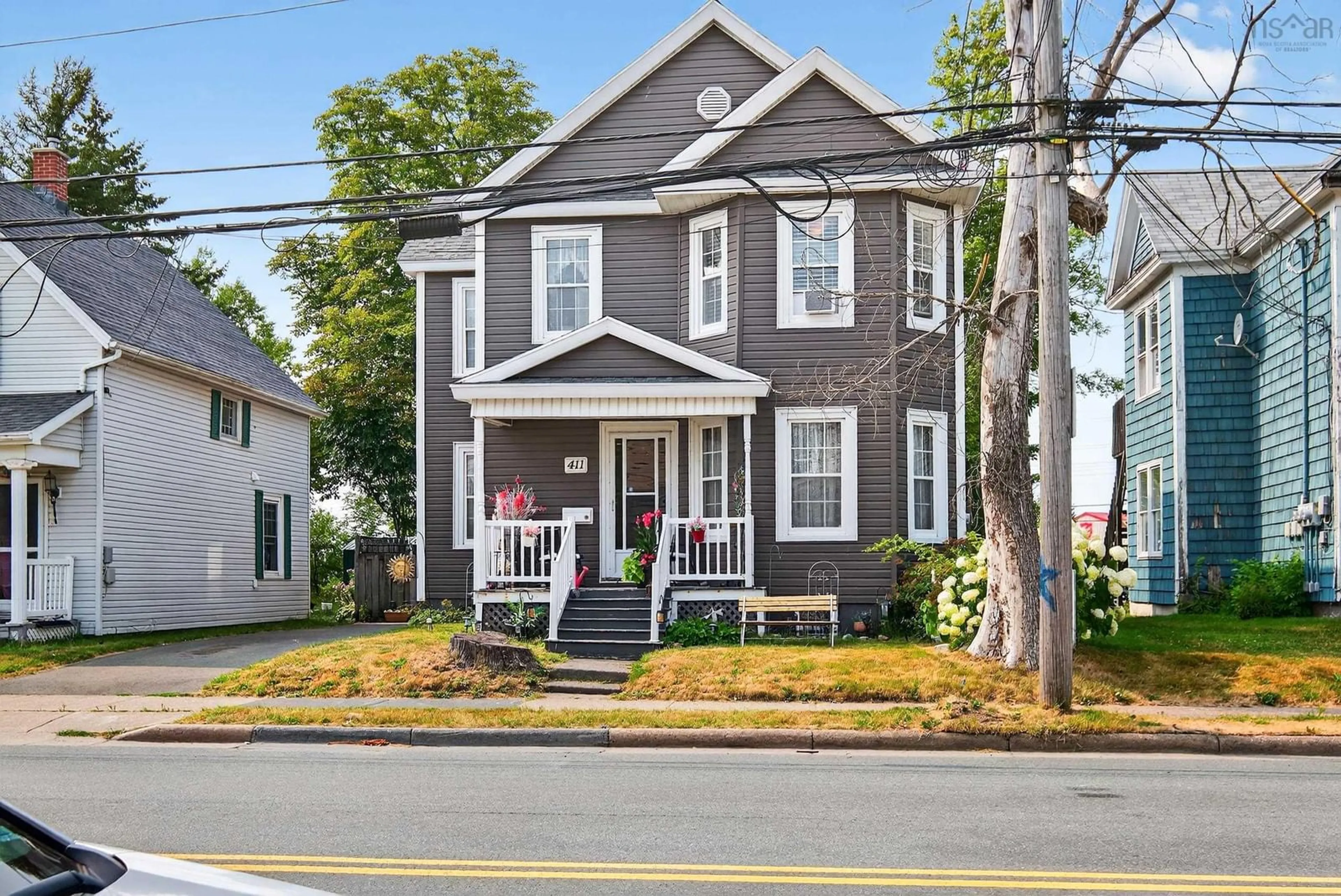 Home with vinyl exterior material, street for 411 Townsend Street, Sydney Nova Scotia B1P 6G3