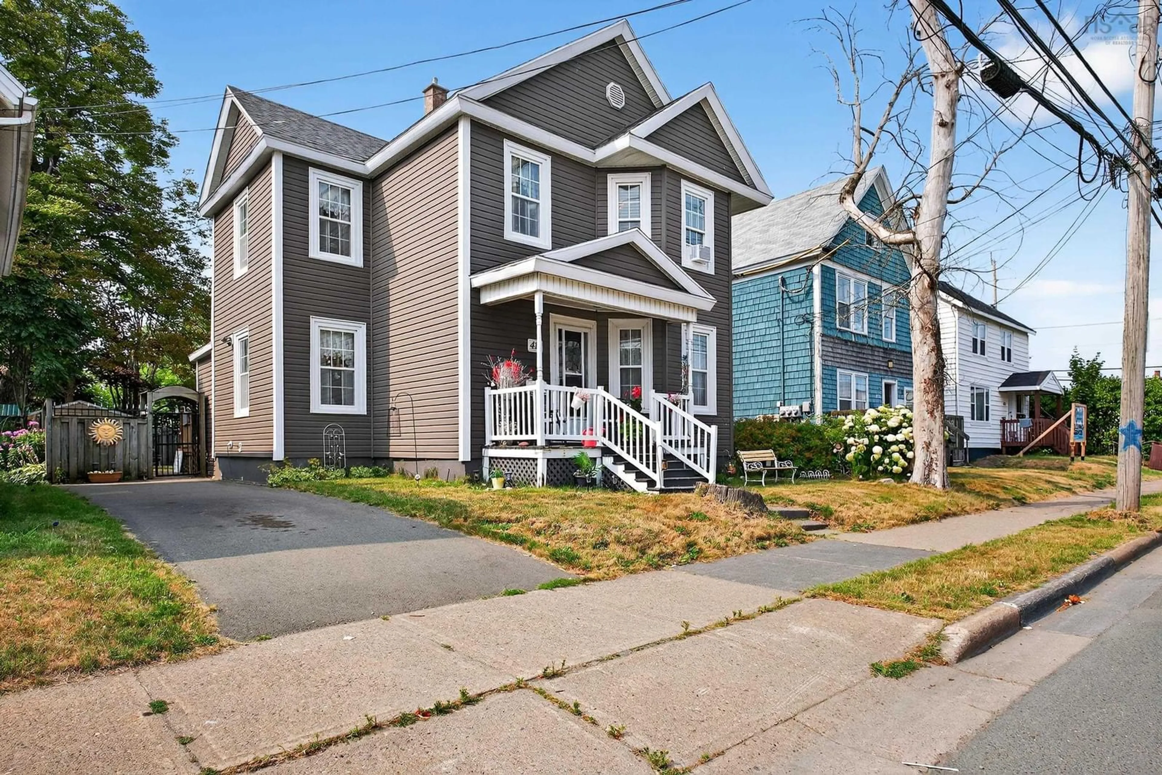 Home with vinyl exterior material, street for 411 Townsend Street, Sydney Nova Scotia B1P 6G3