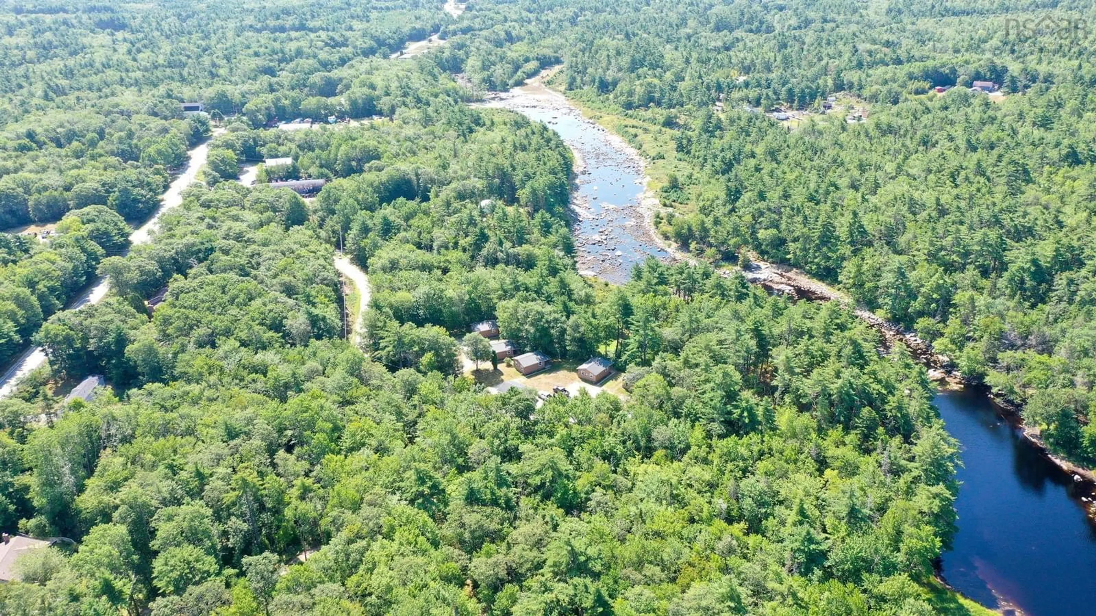 A pic from outside/outdoor area/front of a property/back of a property/a pic from drone, water/lake/river/ocean view for 47 Riverview Dr, Lower Ohio Nova Scotia B0T 1W0