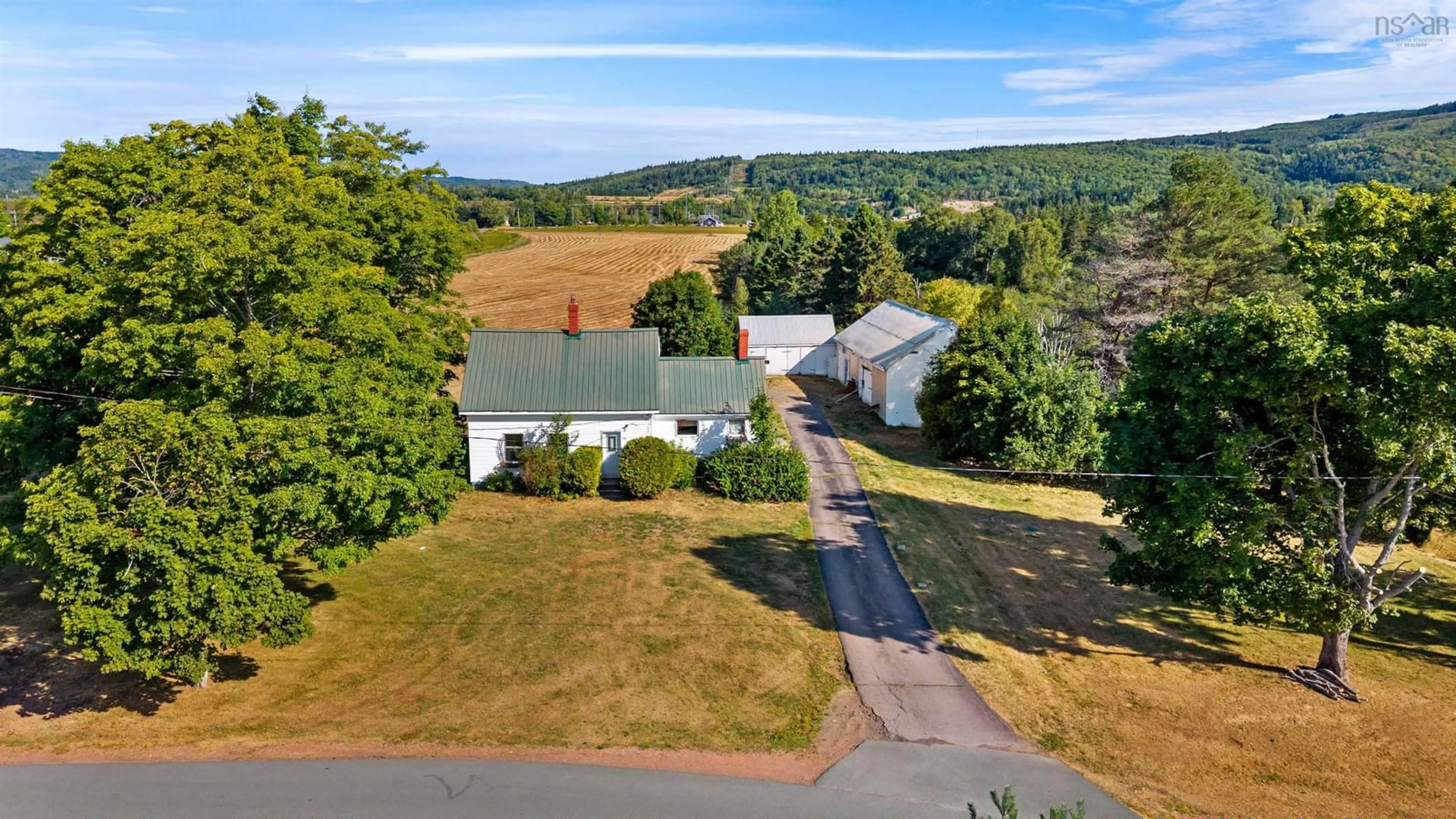 A pic from outside/outdoor area/front of a property/back of a property/a pic from drone, mountain view for 248 Mill St, Parrsboro Nova Scotia B0M 1S0