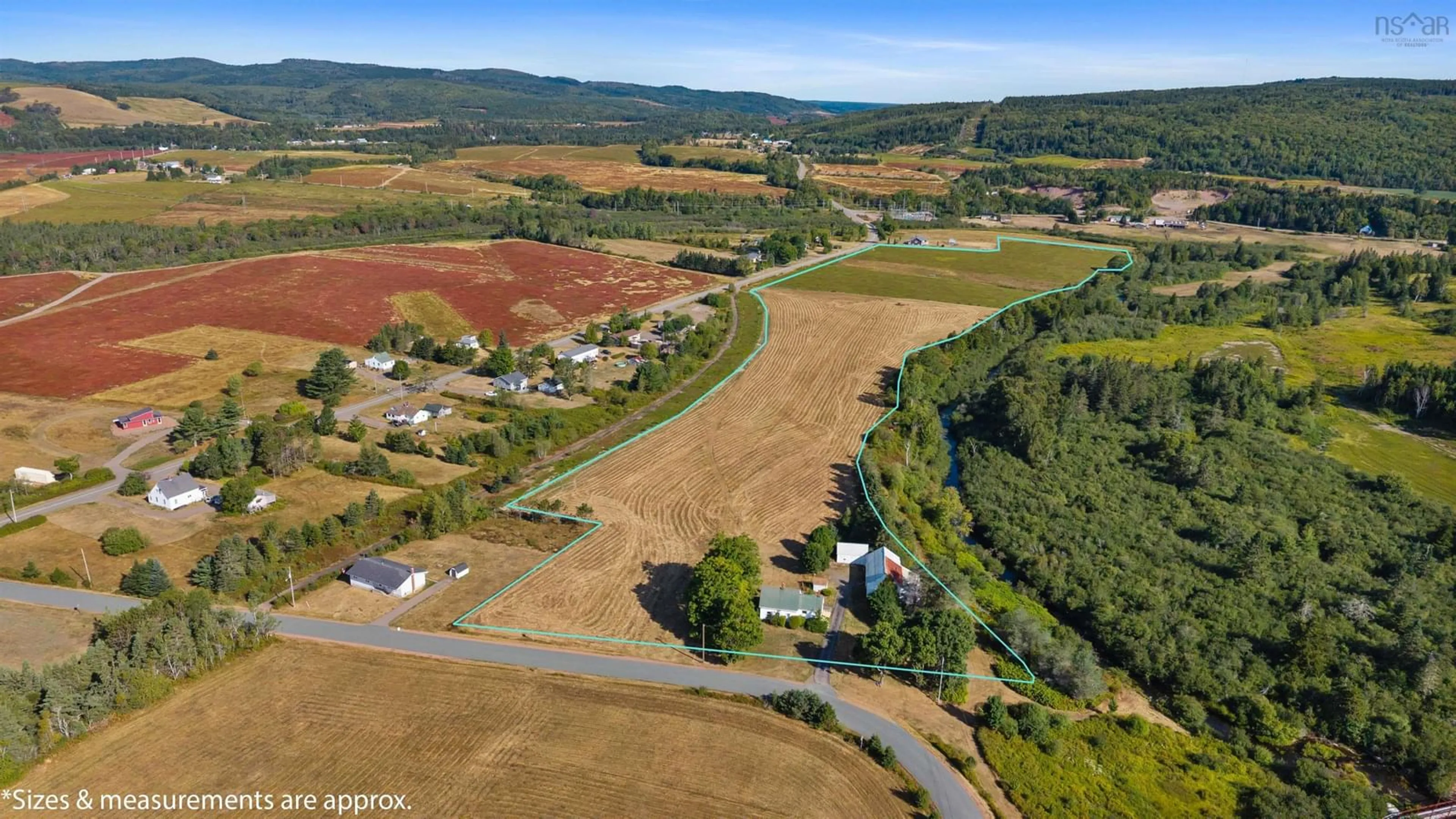 A pic from outside/outdoor area/front of a property/back of a property/a pic from drone, unknown for 248 Mill St, Parrsboro Nova Scotia B0M 1S0