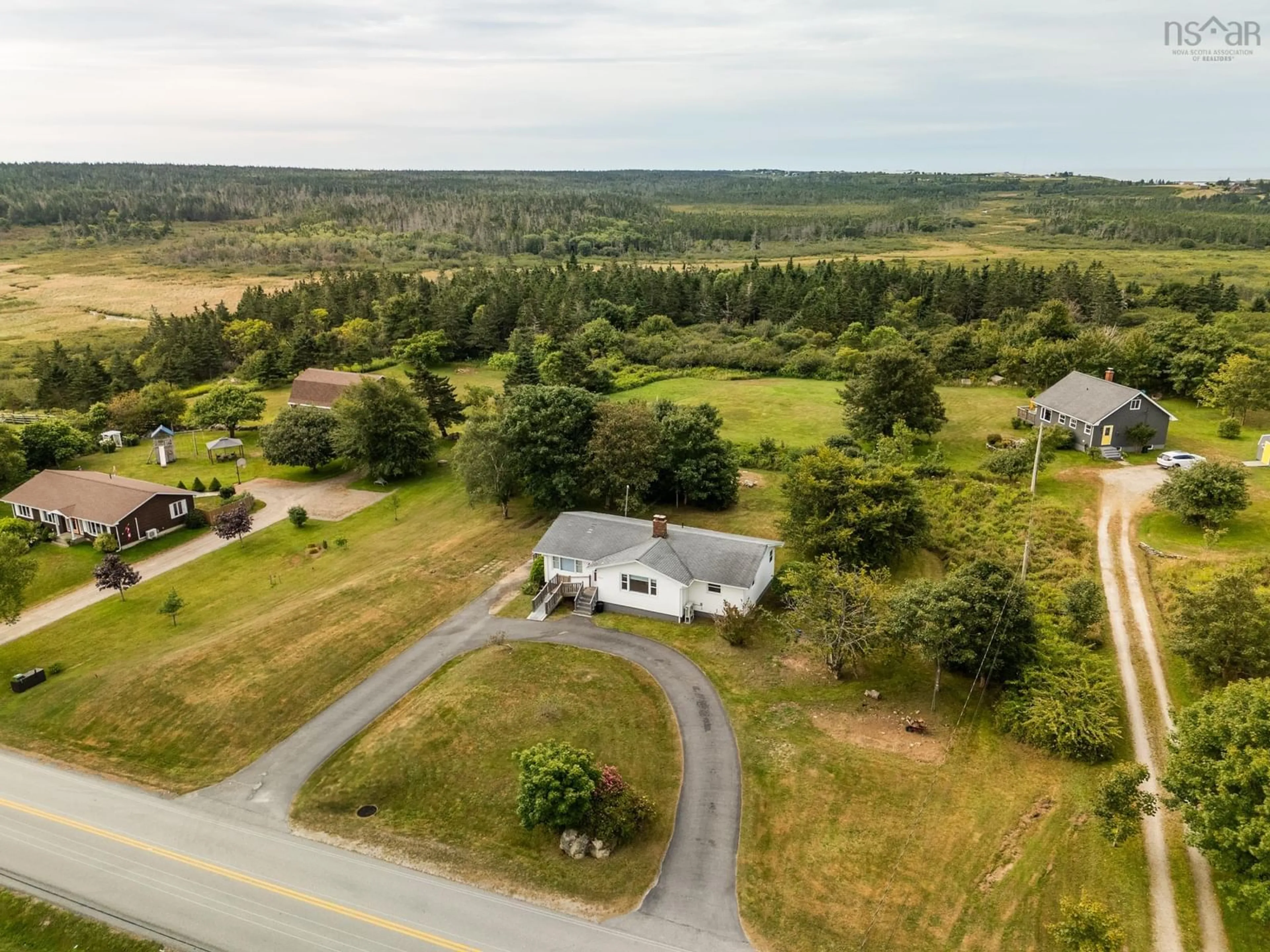 A pic from outside/outdoor area/front of a property/back of a property/a pic from drone, unknown for 721 Wyman Rd, Sand Beach Nova Scotia B5A 5G4