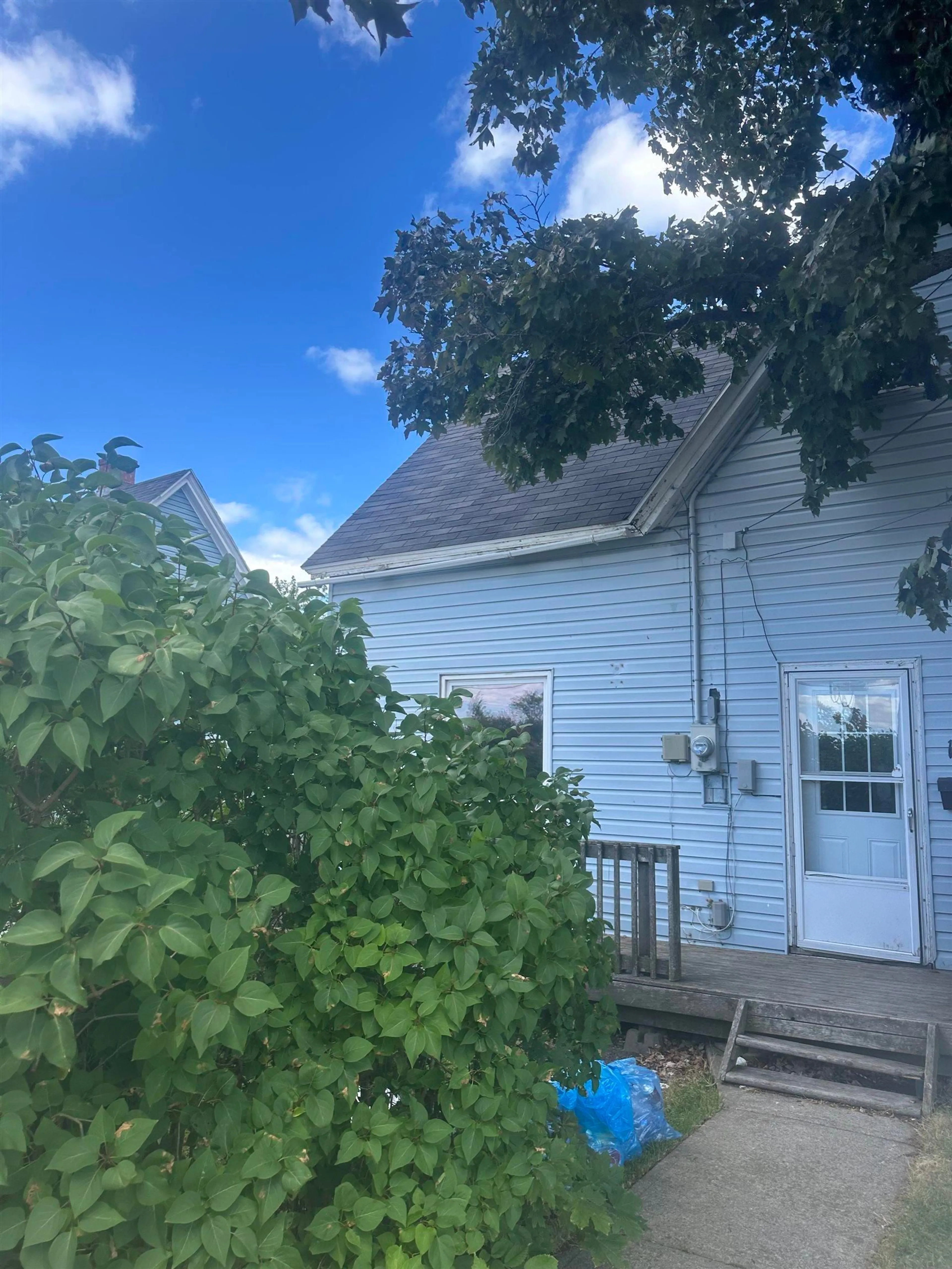 A pic from outside/outdoor area/front of a property/back of a property/a pic from drone, unknown for 194 Victoria Rd, Sydney Nova Scotia B1P 2V6