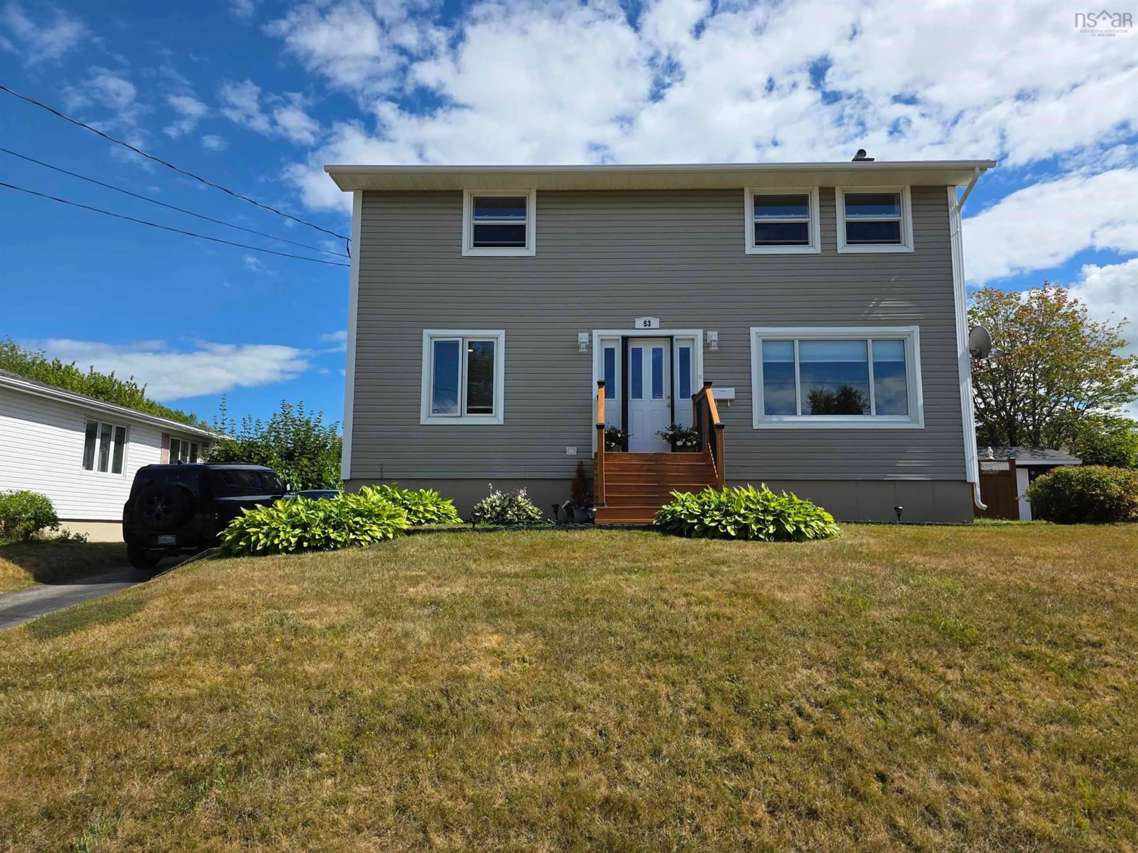 A pic from outside/outdoor area/front of a property/back of a property/a pic from drone, water/lake/river/ocean view for 53 Holyrood Dr, Sydney Nova Scotia B1S 1Y1