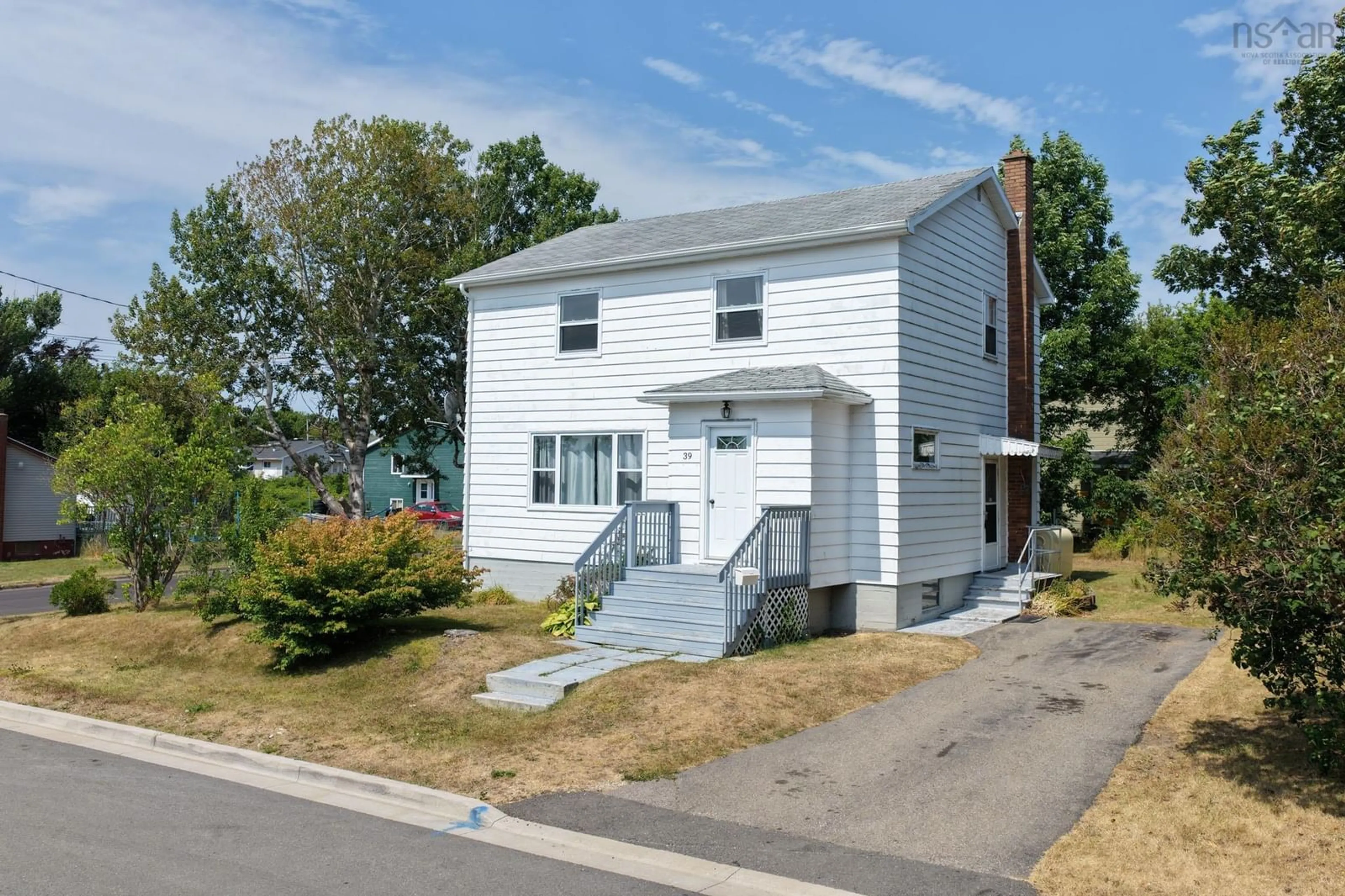 Home with vinyl exterior material, street for 39 Elmwood Ave, Sydney Nova Scotia B1N 2J2