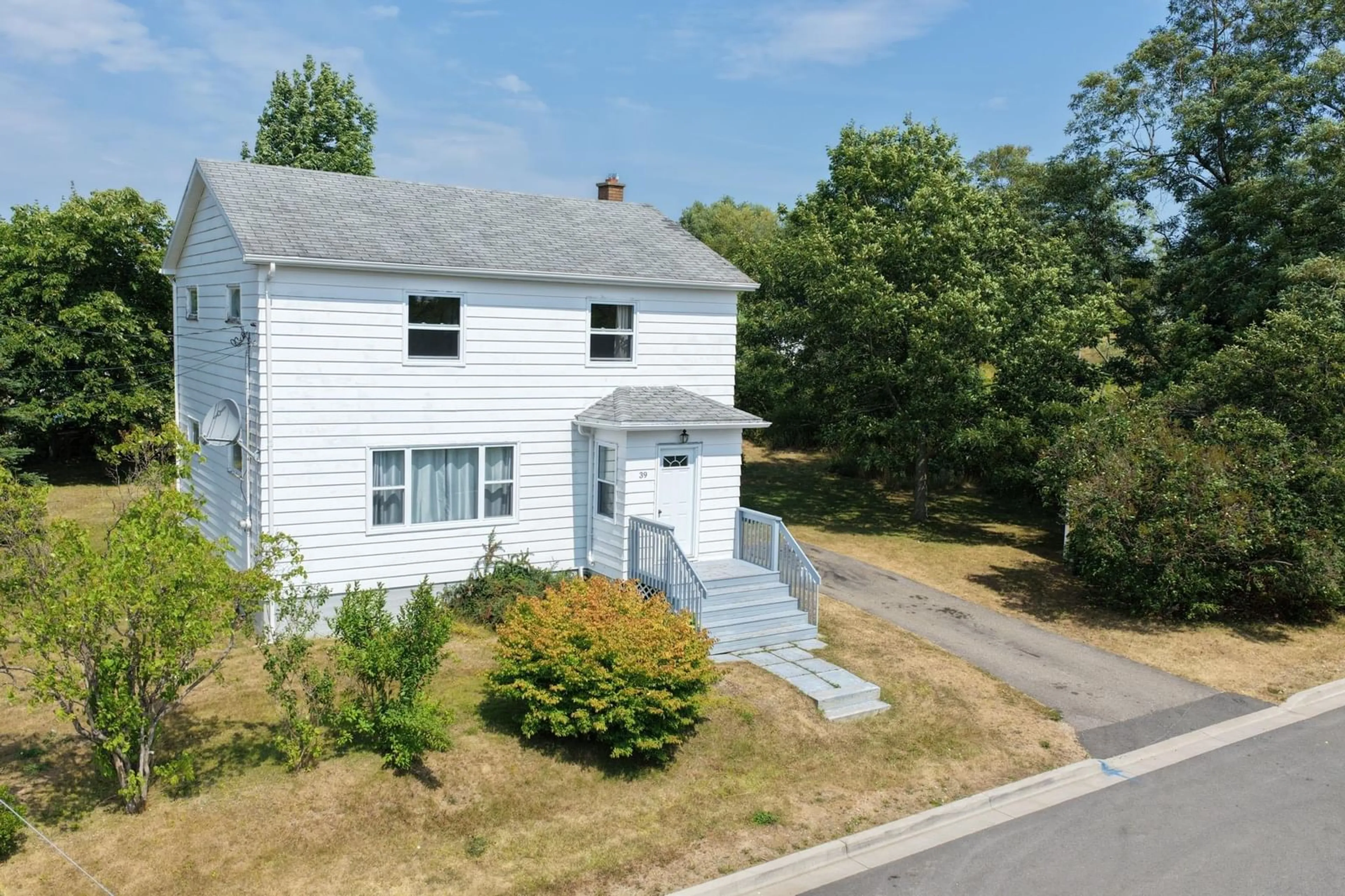 A pic from outside/outdoor area/front of a property/back of a property/a pic from drone, street for 39 Elmwood Ave, Sydney Nova Scotia B1N 2J2
