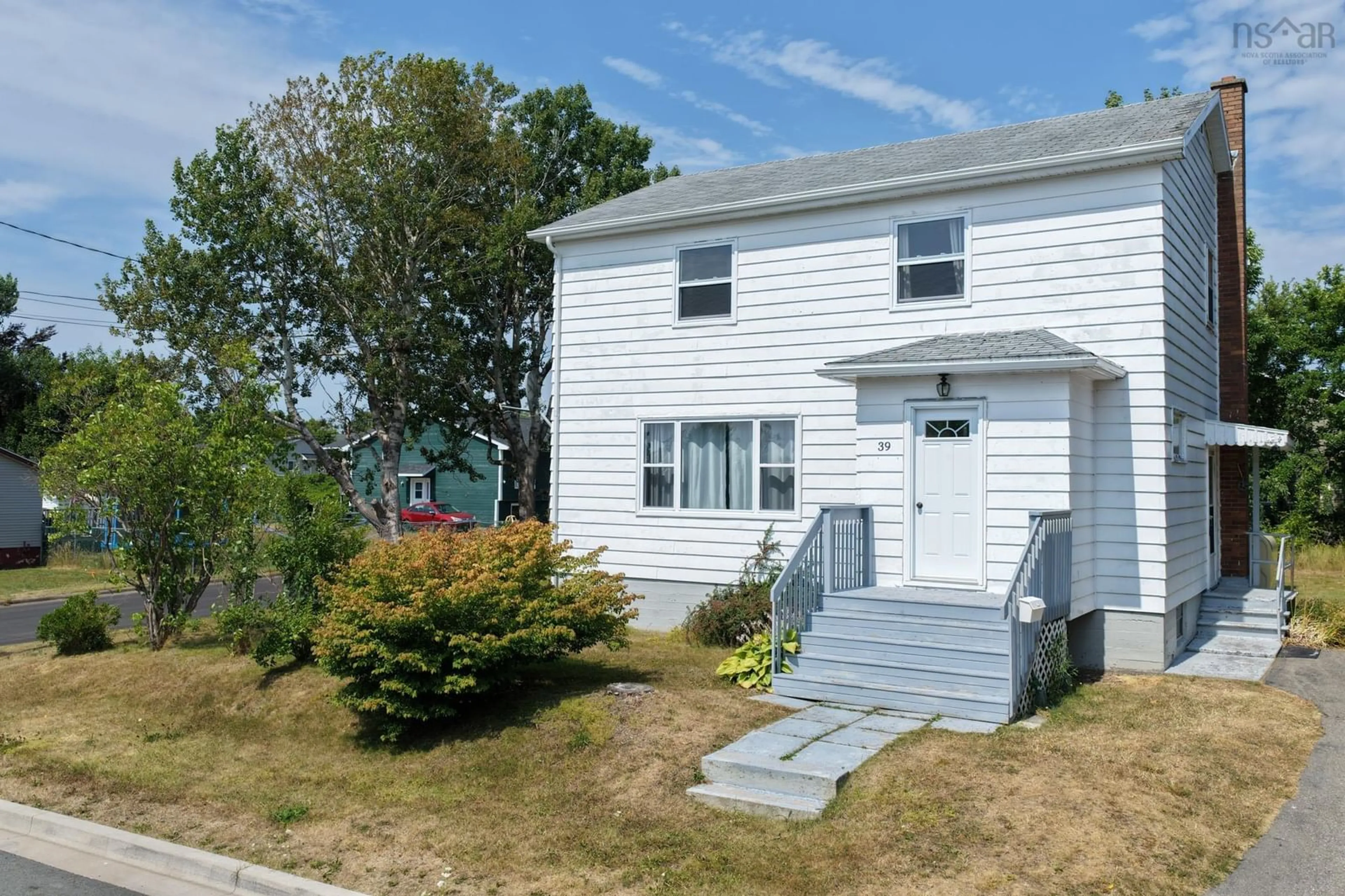Home with vinyl exterior material, street for 39 Elmwood Ave, Sydney Nova Scotia B1N 2J2