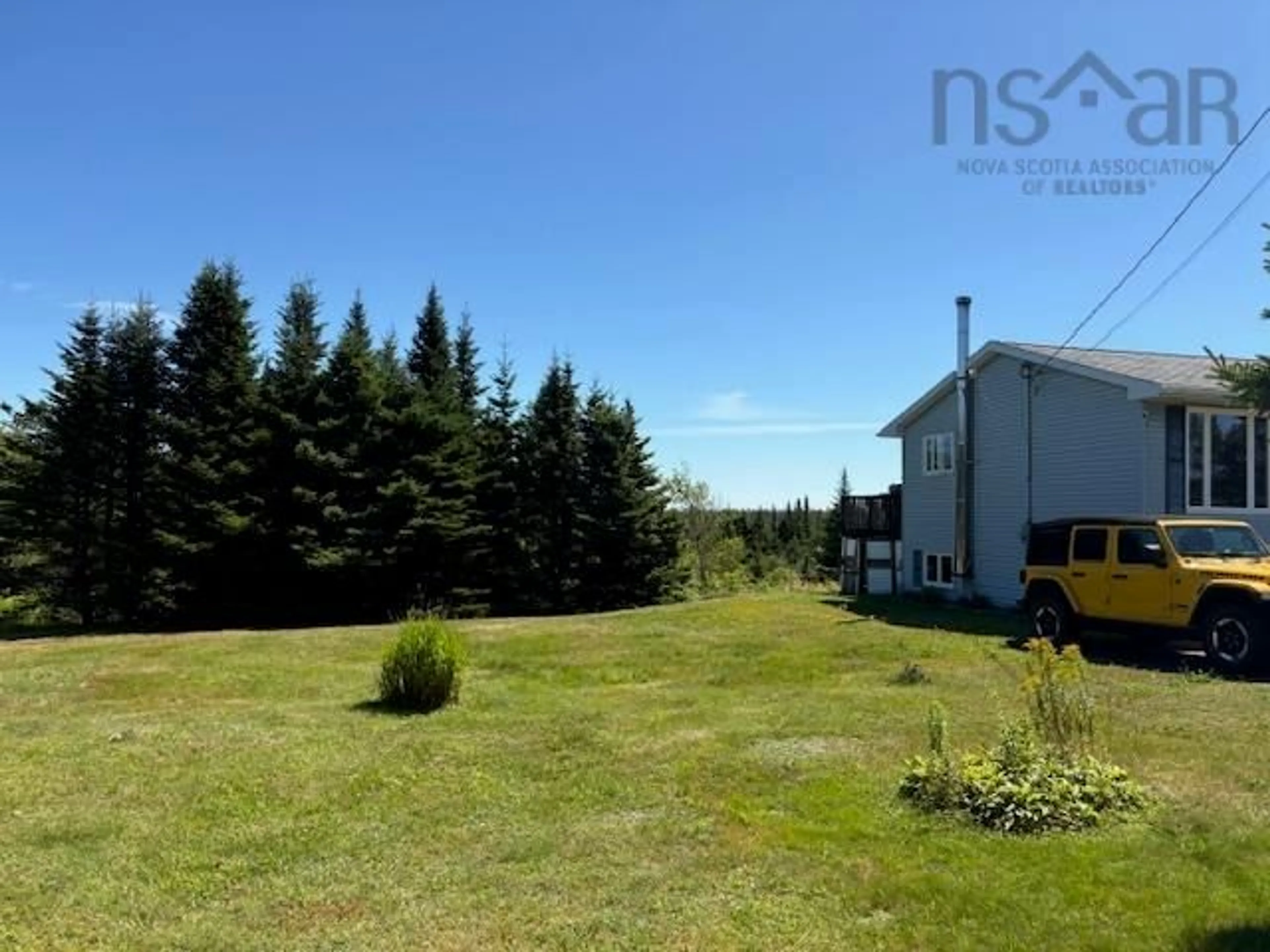 A pic from outside/outdoor area/front of a property/back of a property/a pic from drone, forest/trees view for 167 Smiths Point Rd, East Quoddy Nova Scotia B0J 2R0