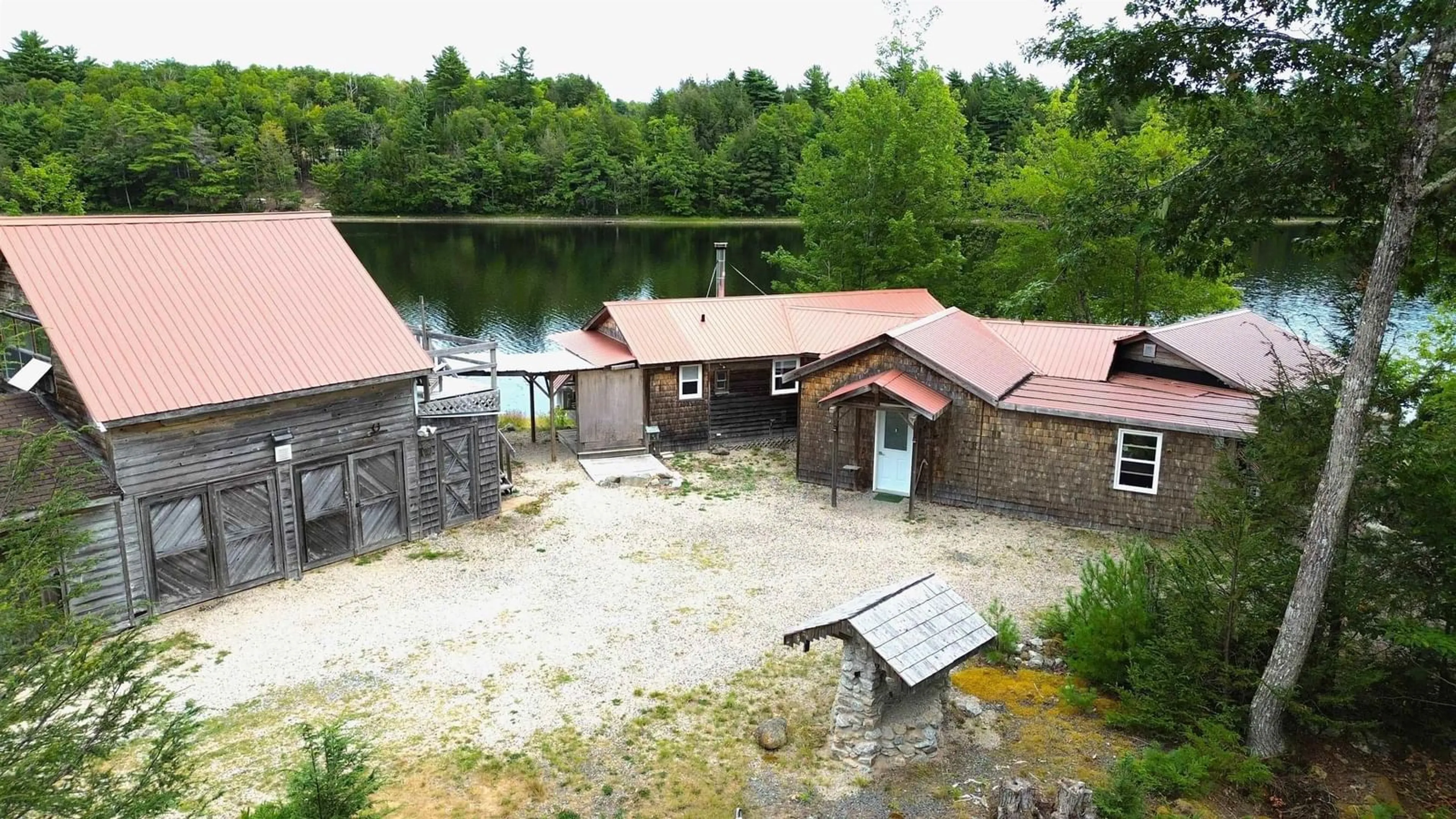 A pic from outside/outdoor area/front of a property/back of a property/a pic from drone, water/lake/river/ocean view for 597 Peters Point Rd, South Brookfield Nova Scotia B0T 1X0