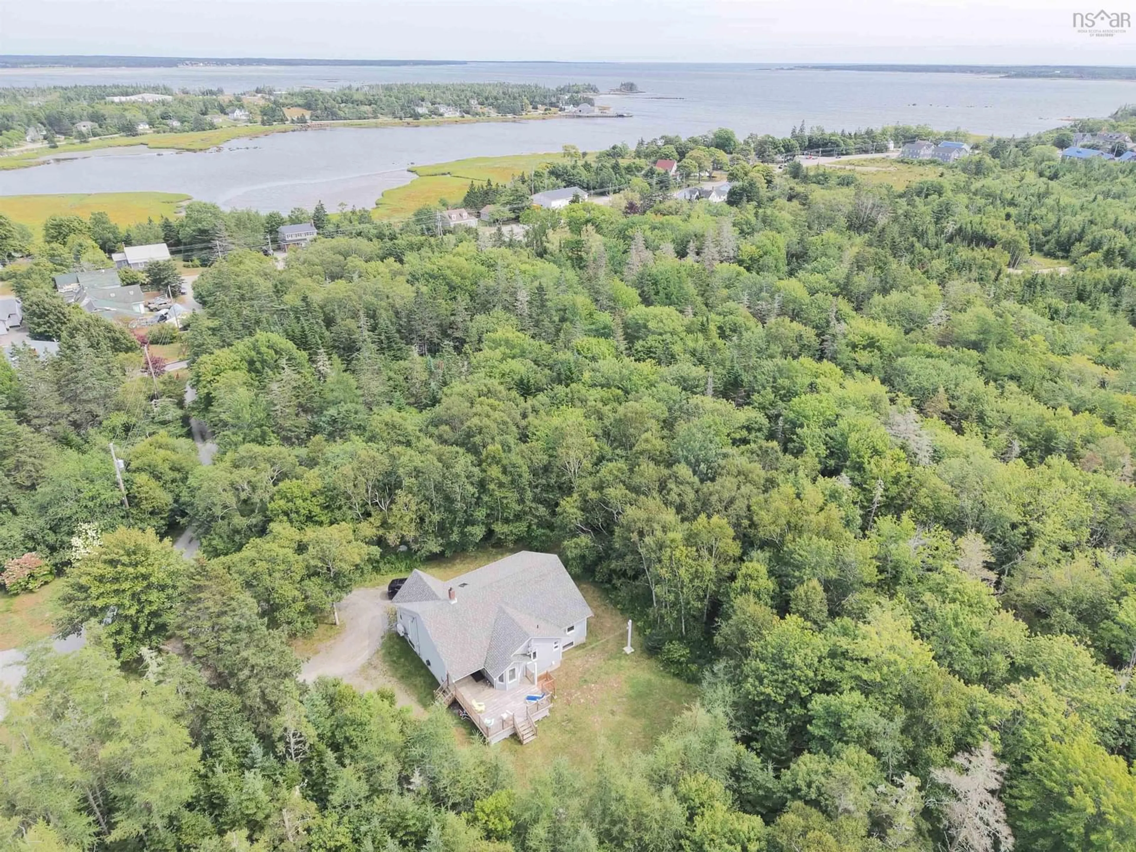 A pic from outside/outdoor area/front of a property/back of a property/a pic from drone, water/lake/river/ocean view for 23 Shannon Lane, Barrington Nova Scotia B0W 1G0