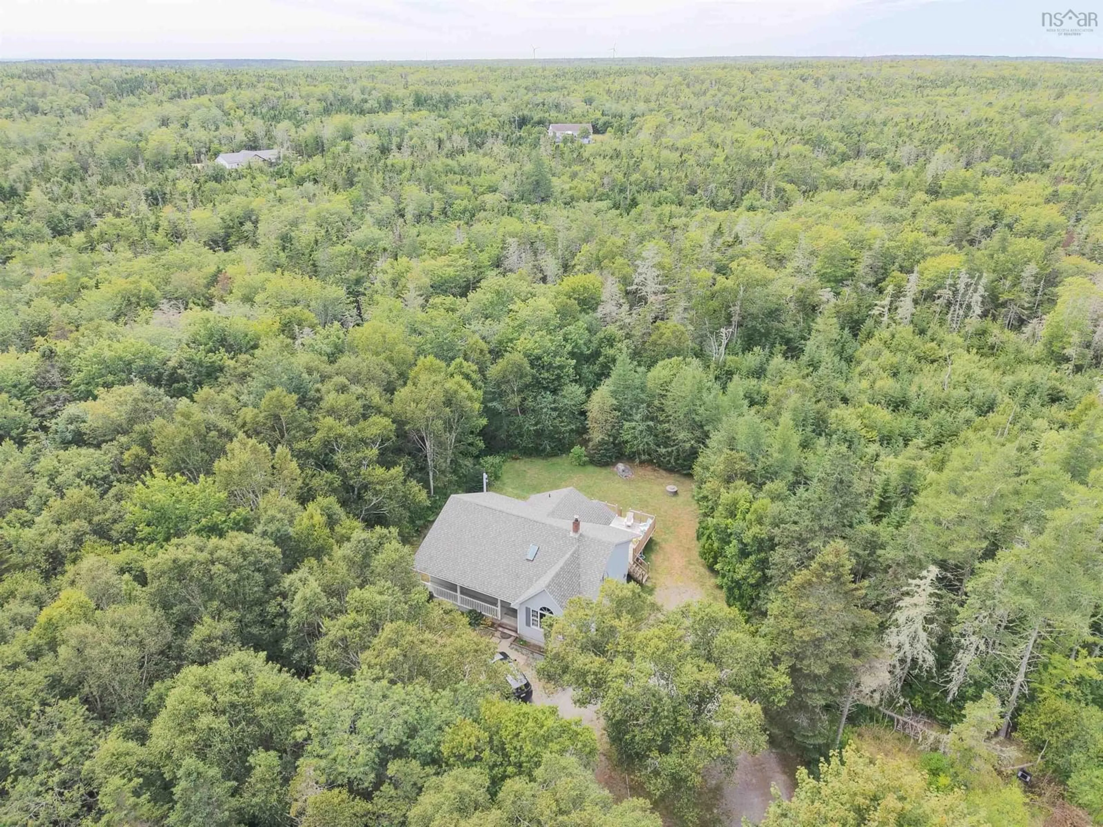 A pic from outside/outdoor area/front of a property/back of a property/a pic from drone, forest/trees view for 23 Shannon Lane, Barrington Nova Scotia B0W 1G0