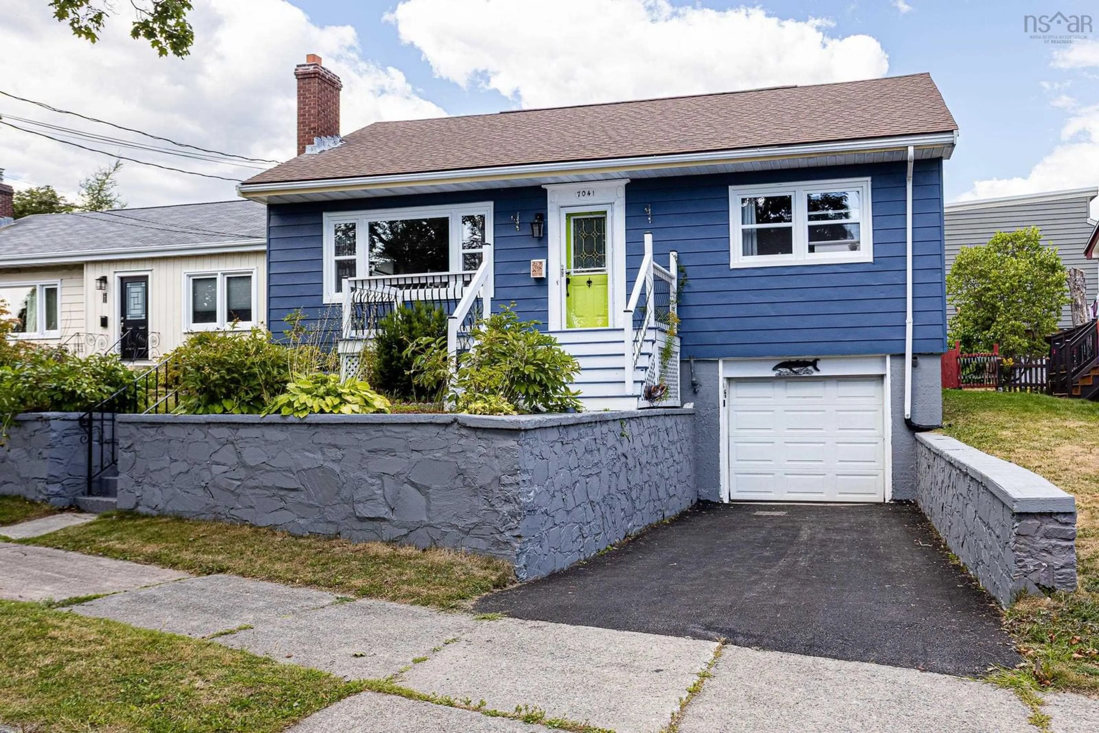 Home with vinyl exterior material, street for 7041 Pearson Dr, Halifax Nova Scotia B3L 2K7