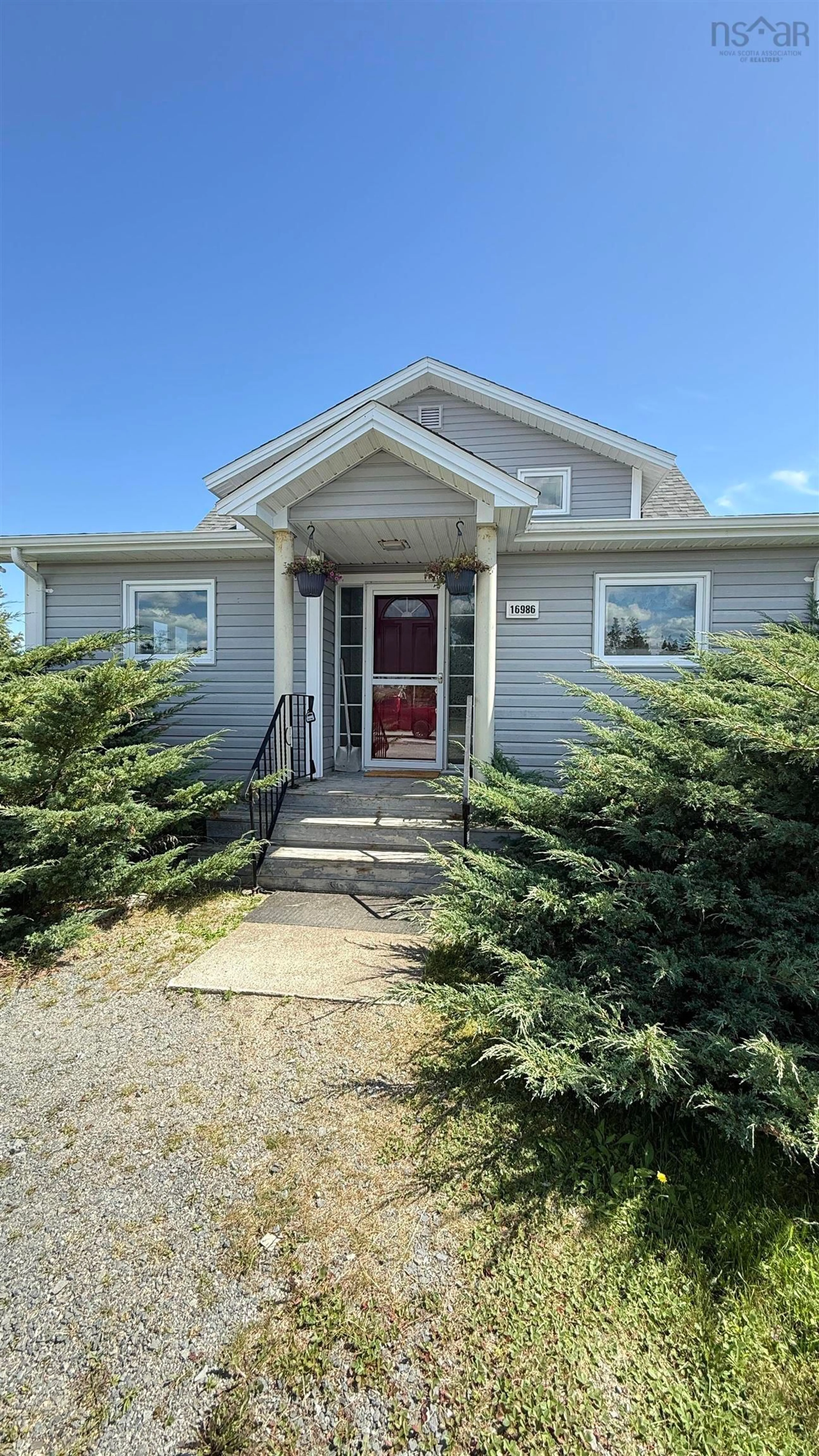 Home with vinyl exterior material, street for 16986 Highway 7, Pleasant Harbour Nova Scotia B0J 3H0