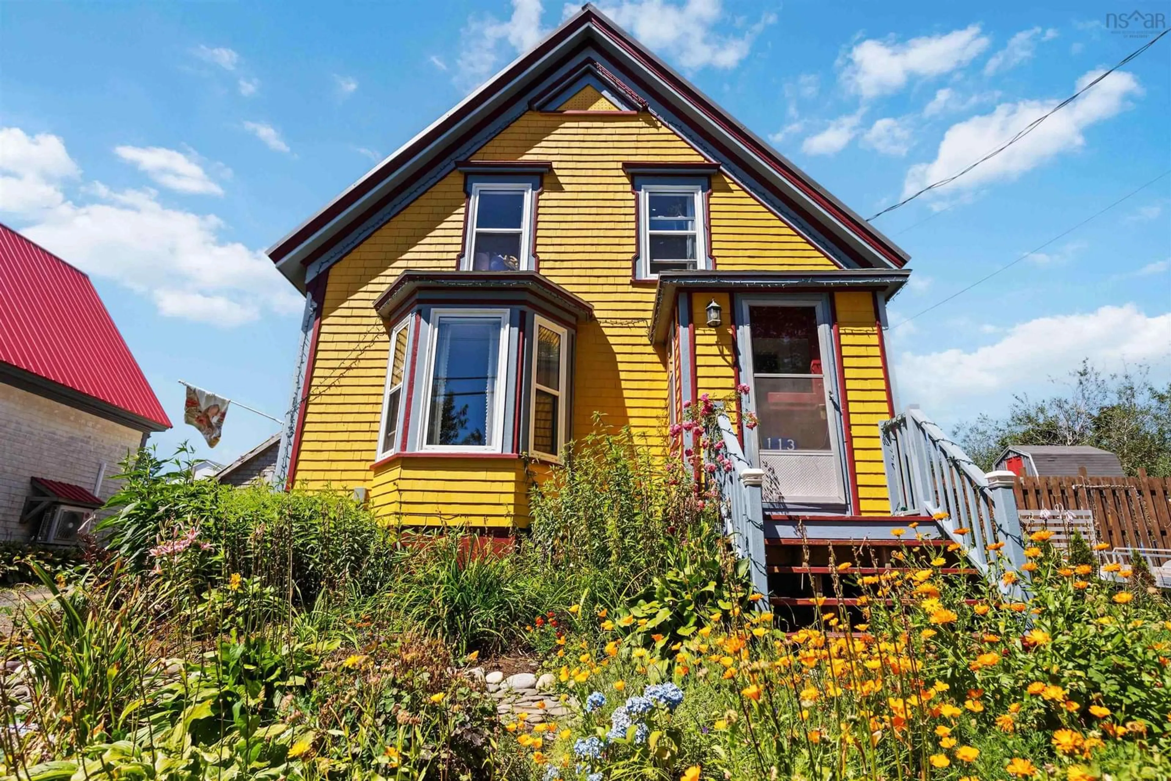 Home with vinyl exterior material, street for 113 Second St, Westport Nova Scotia B0V 1H0