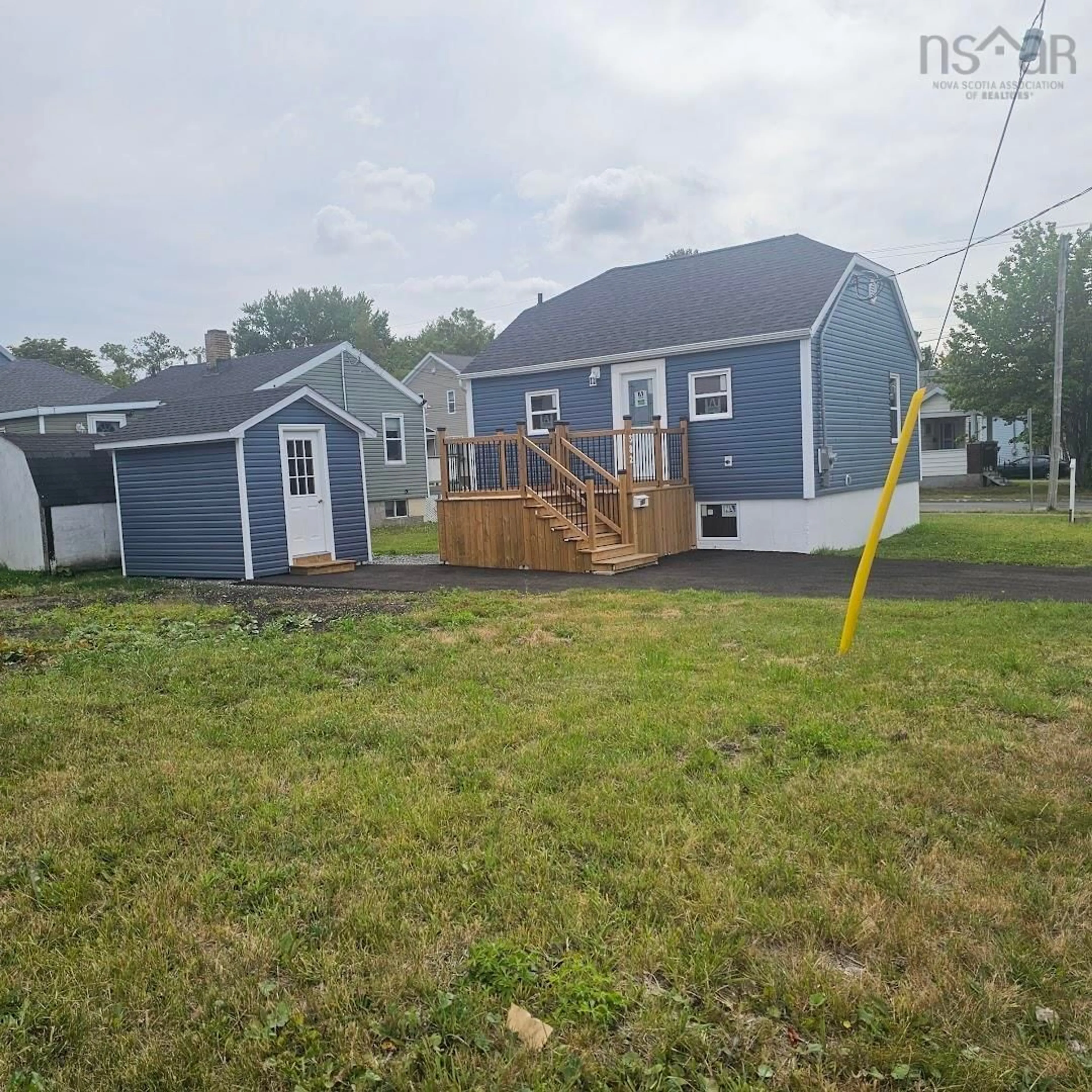 Home with vinyl exterior material, street for 382 Chestnut Dr, Sydney Nova Scotia B1P 4Y8