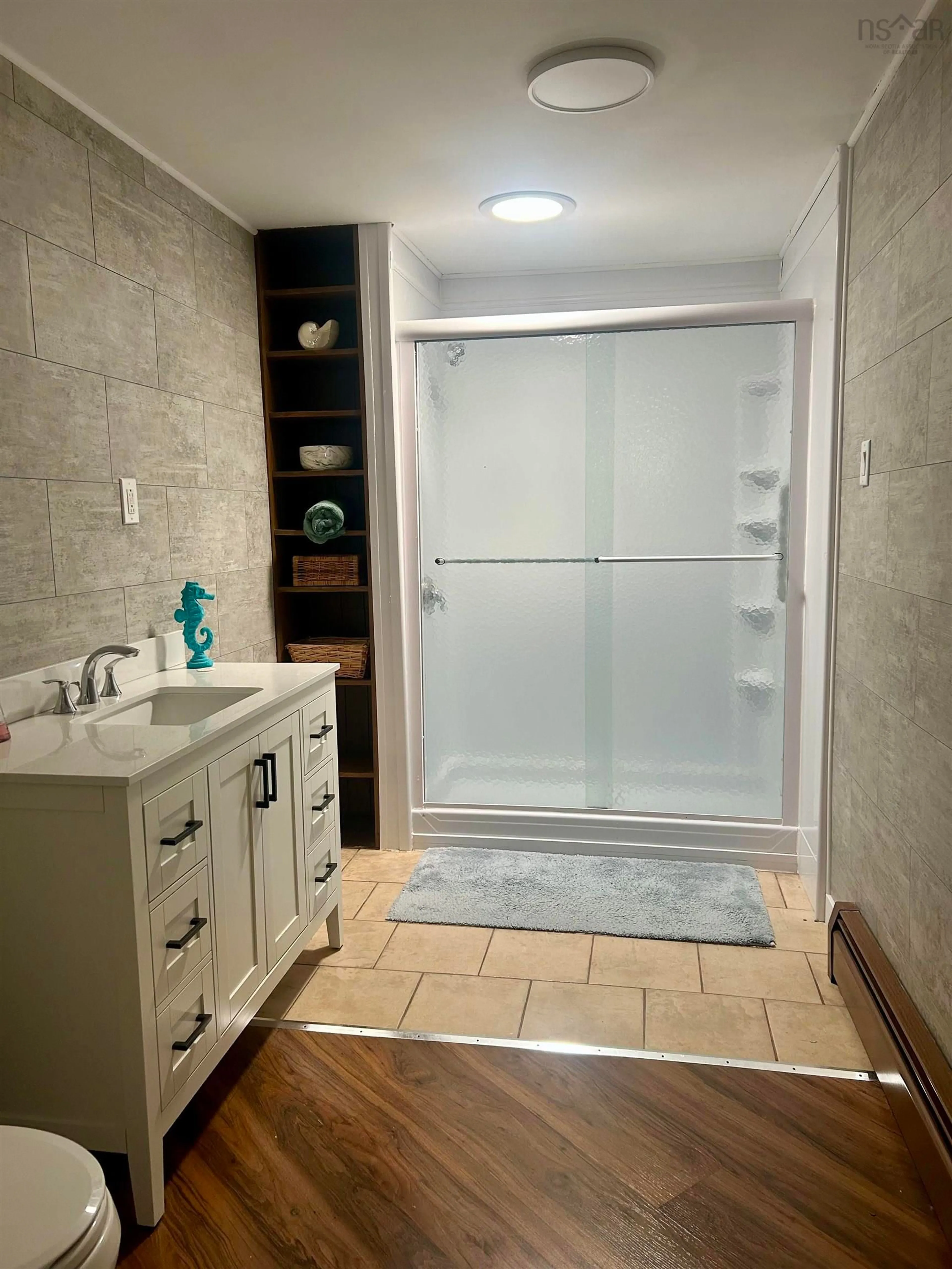 Contemporary bathroom, ceramic/tile floor for 7561 Main St., Louisbourg Nova Scotia B1C 1J7