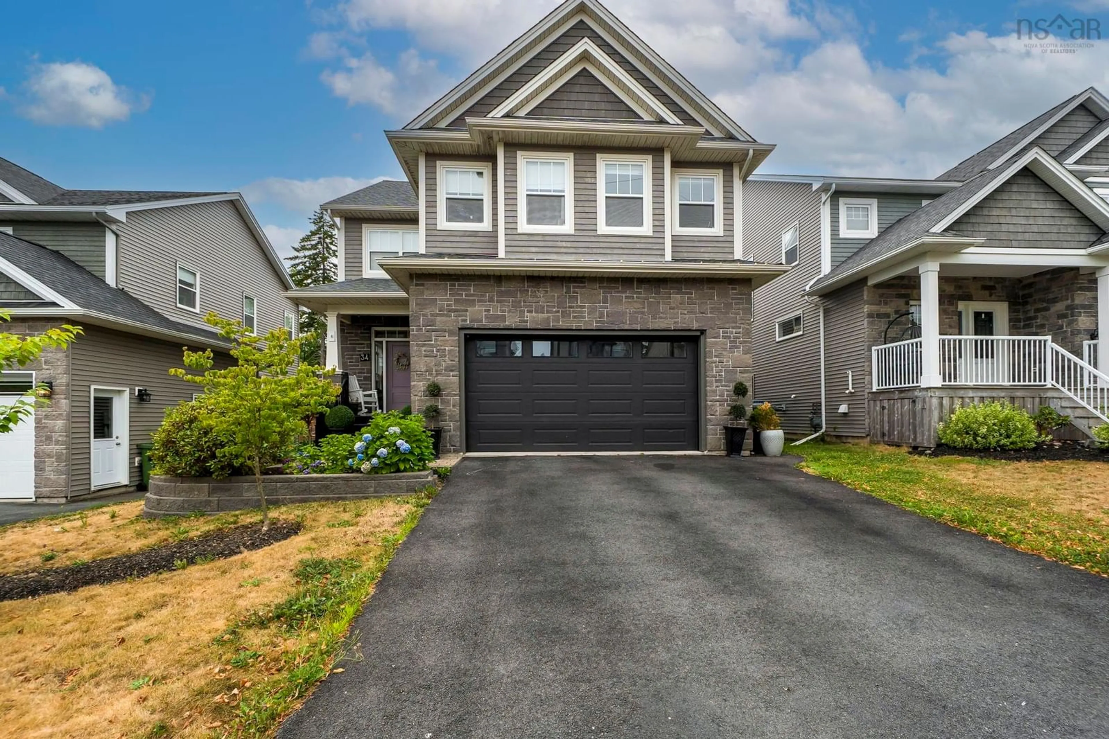 Home with vinyl exterior material, street for 34 Evandale Lane, Bedford Nova Scotia B4B 0T2