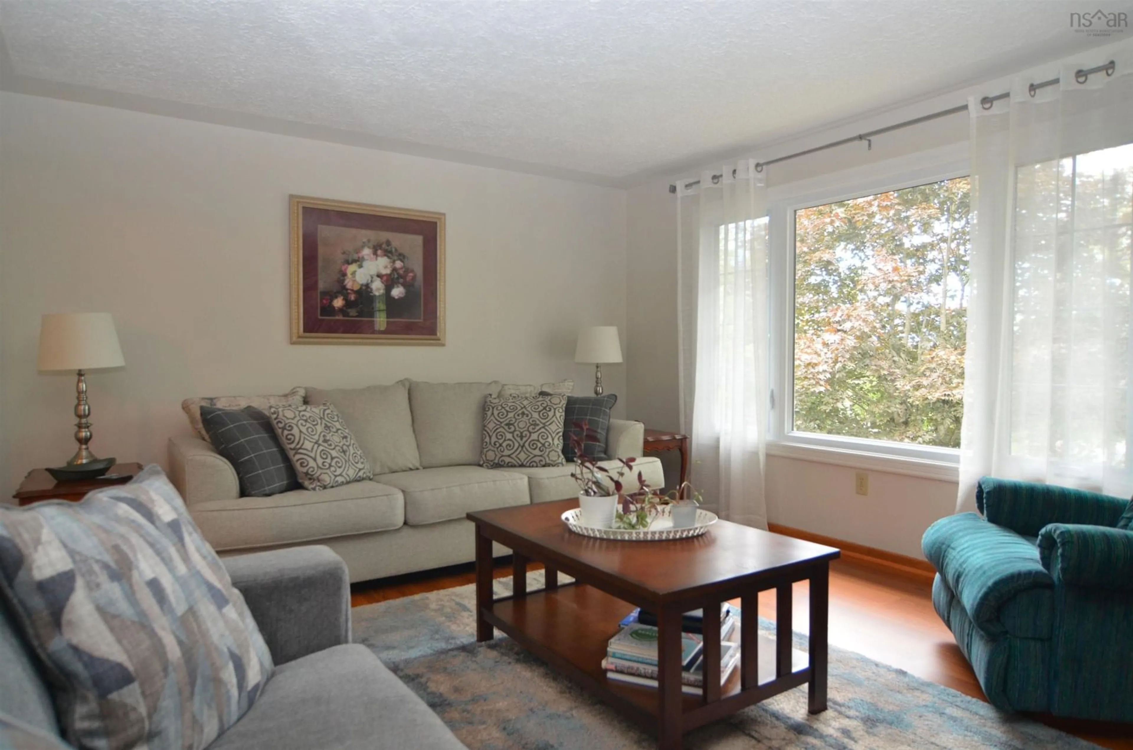 Living room with furniture, wood/laminate floor for 32 Tremont St, Dartmouth Nova Scotia B2Y 1X2