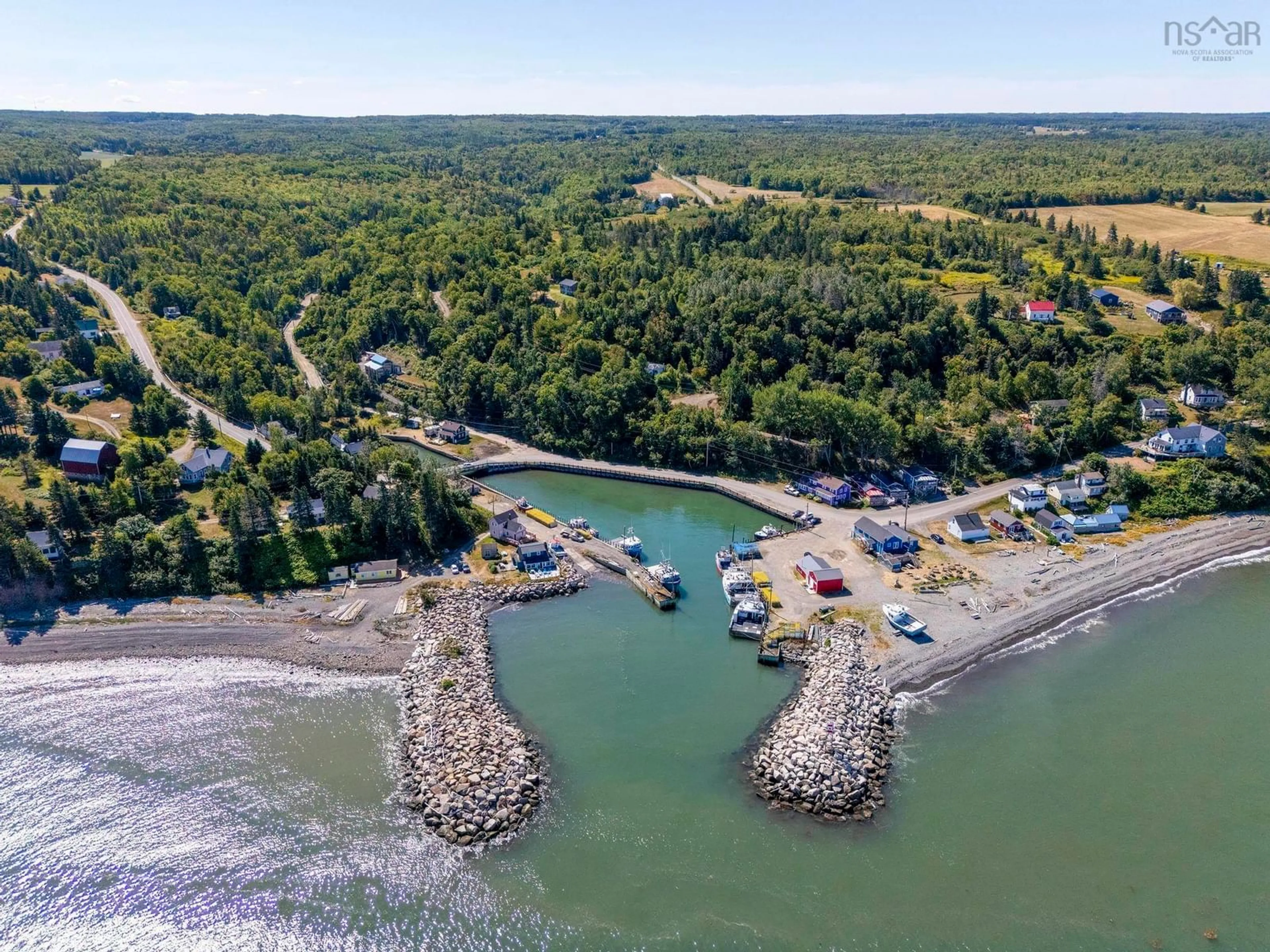 A pic from outside/outdoor area/front of a property/back of a property/a pic from drone, water/lake/river/ocean view for 1483 Hamilton Rd, Harbourville Nova Scotia B0P 1E0
