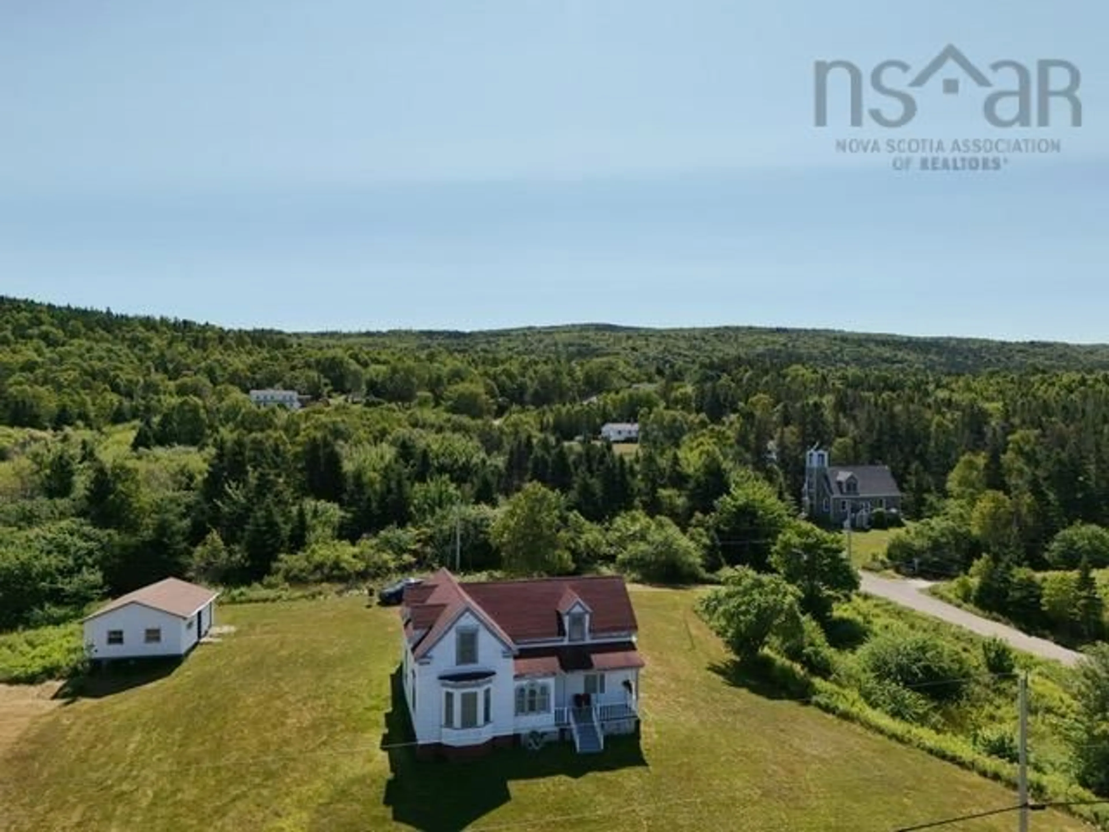A pic from outside/outdoor area/front of a property/back of a property/a pic from drone, water/lake/river/ocean view for 11 Kellys Lane, Englishtown Nova Scotia B0E 1B0