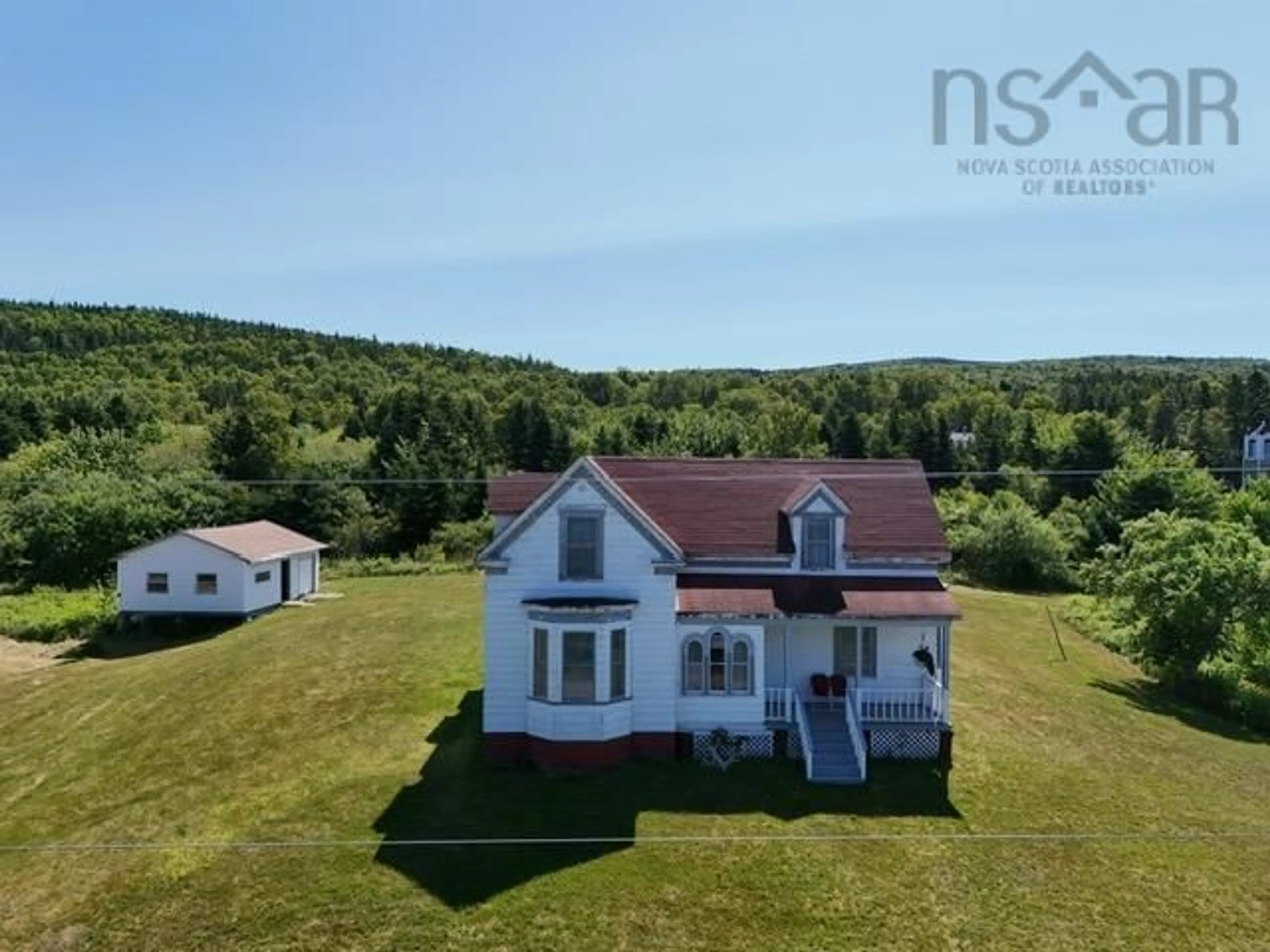 A pic from outside/outdoor area/front of a property/back of a property/a pic from drone, unknown for 11 Kellys Lane, Englishtown Nova Scotia B0E 1B0