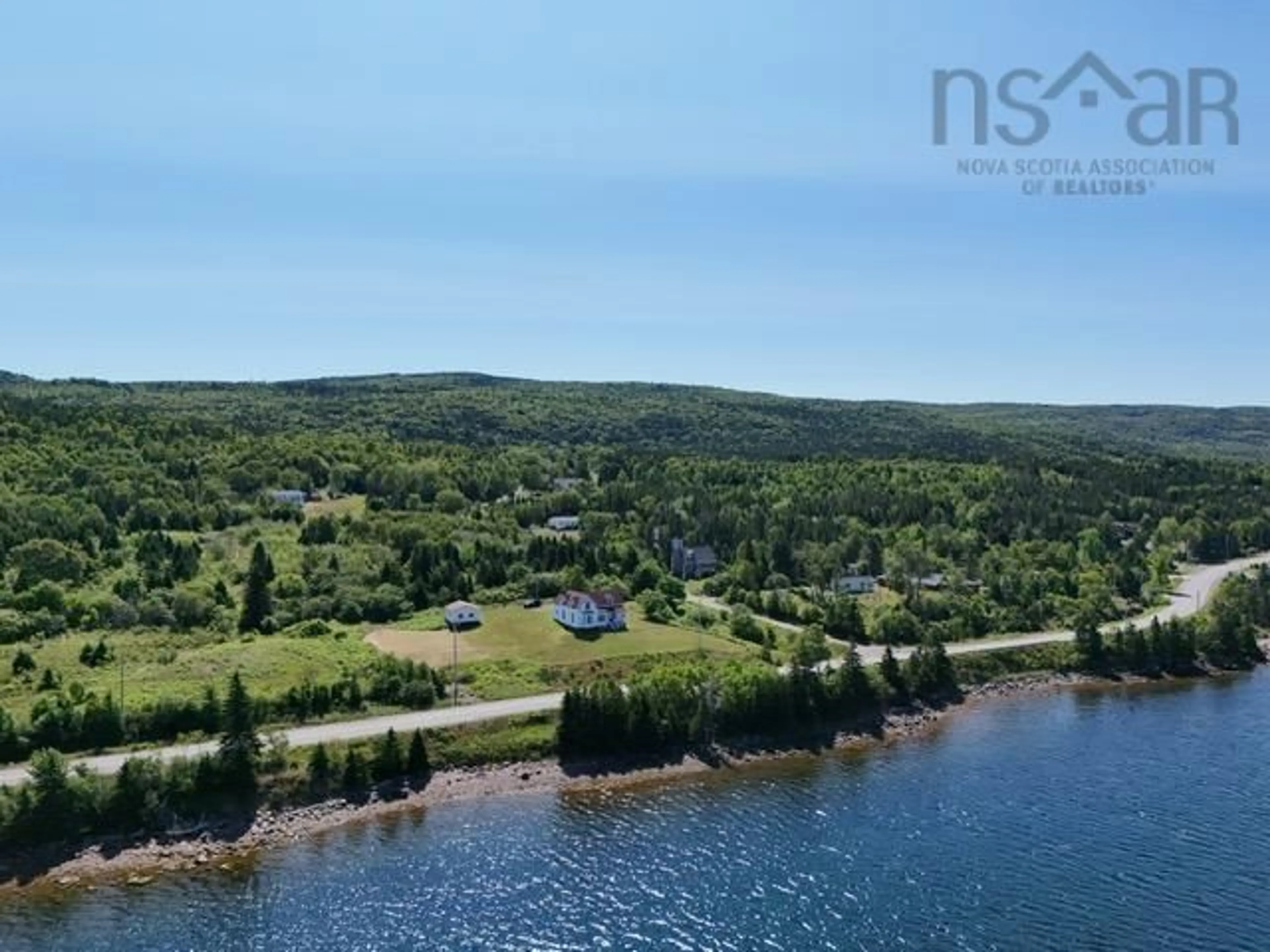 A pic from outside/outdoor area/front of a property/back of a property/a pic from drone, water/lake/river/ocean view for 11 Kellys Lane, Englishtown Nova Scotia B0E 1B0