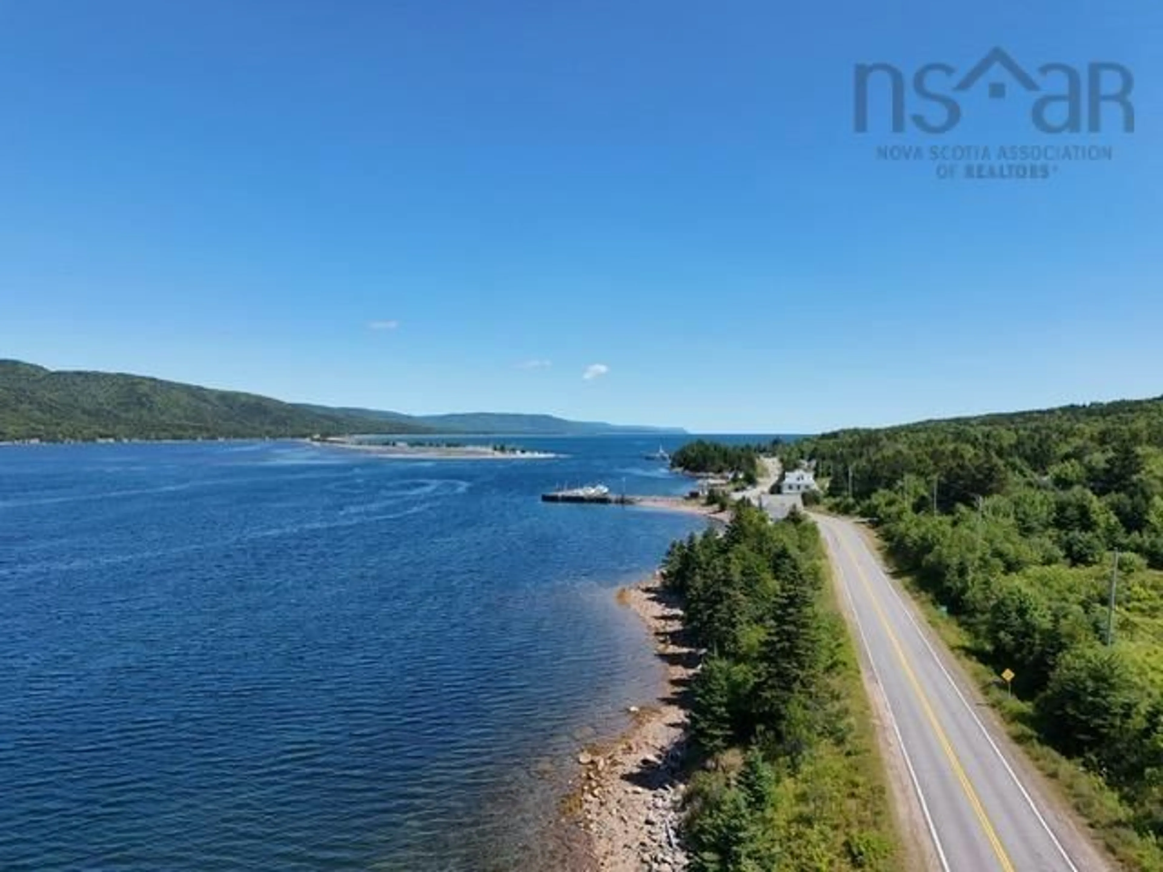 A pic from outside/outdoor area/front of a property/back of a property/a pic from drone, water/lake/river/ocean view for 11 Kellys Lane, Englishtown Nova Scotia B0E 1B0