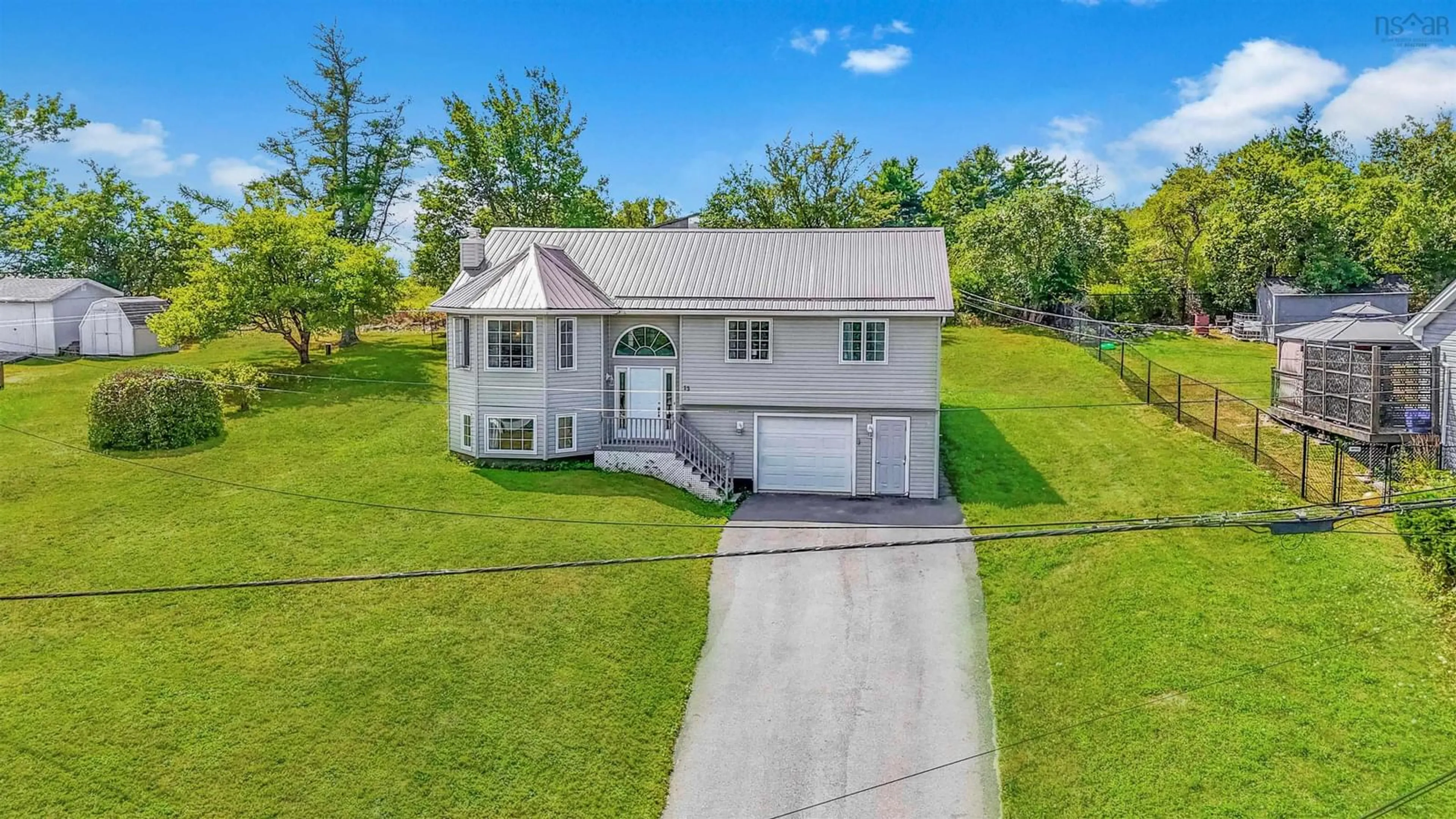 A pic from outside/outdoor area/front of a property/back of a property/a pic from drone, street for 13 First Ave, Upper Sackville Nova Scotia B4E 3B5