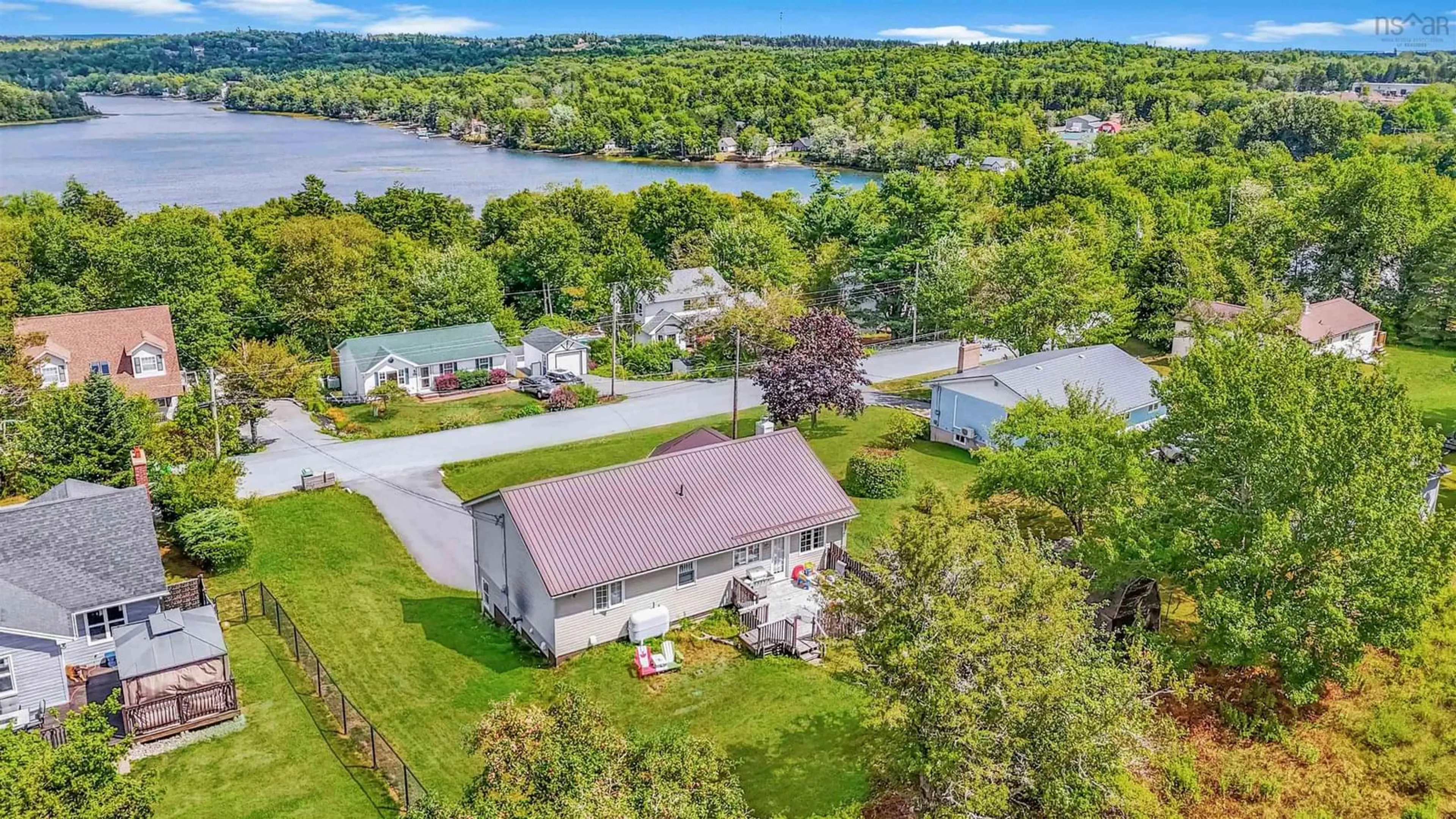 A pic from outside/outdoor area/front of a property/back of a property/a pic from drone, water/lake/river/ocean view for 13 First Ave, Upper Sackville Nova Scotia B4E 3B5