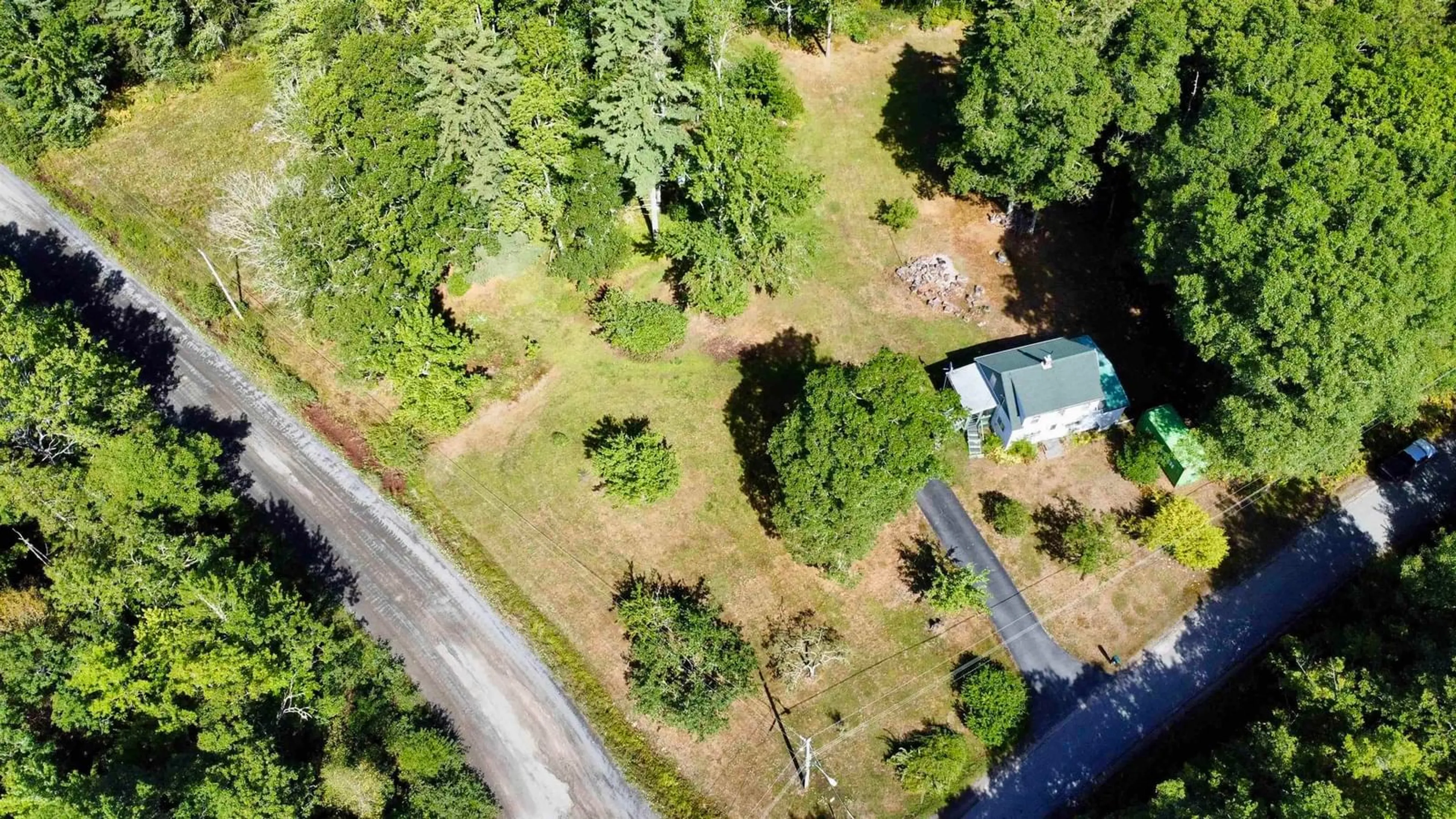 A pic from outside/outdoor area/front of a property/back of a property/a pic from drone, forest/trees view for 9 Silver Rd, North Brookfield Nova Scotia B0T 1X0