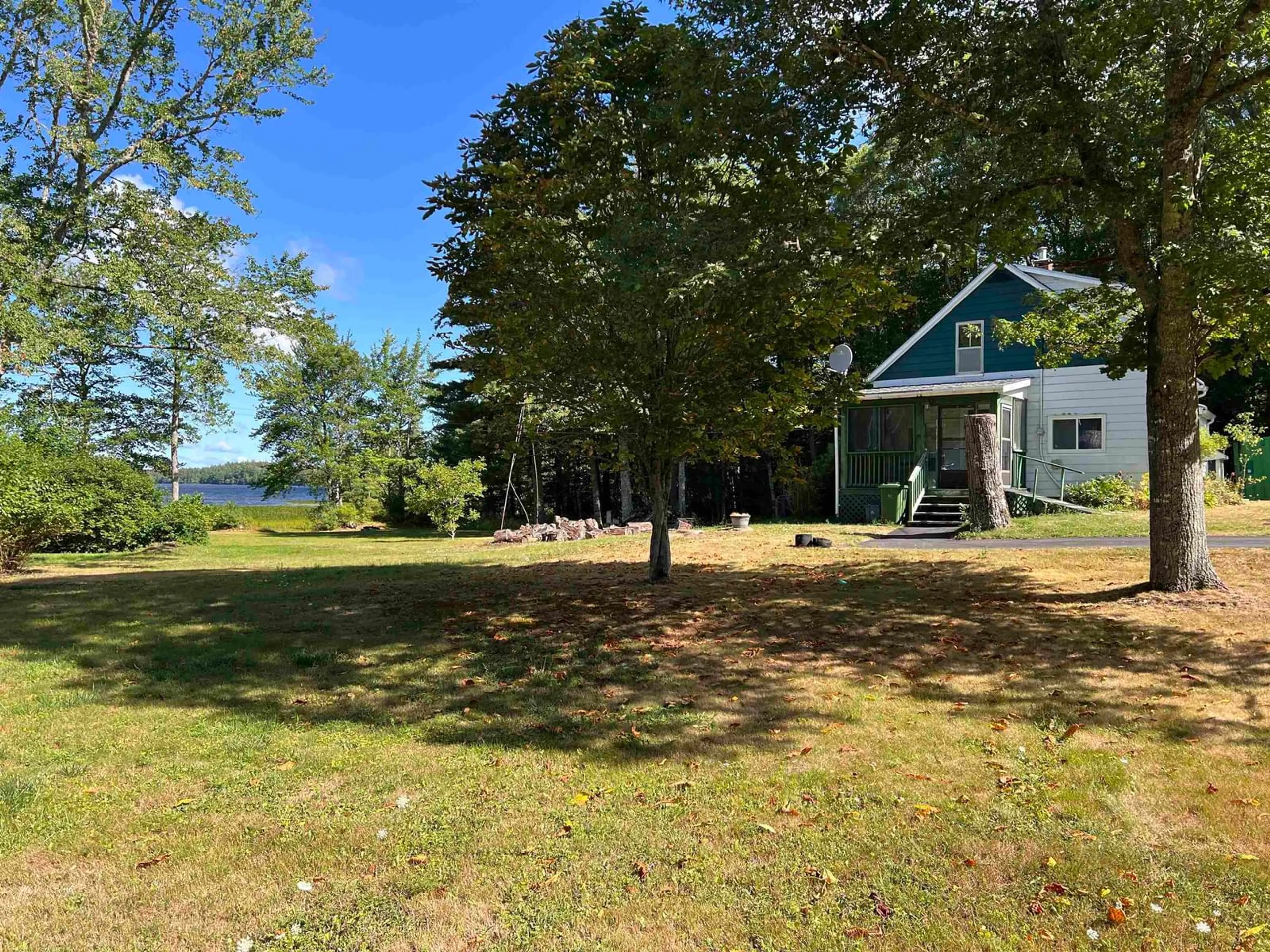 A pic from outside/outdoor area/front of a property/back of a property/a pic from drone, water/lake/river/ocean view for 9 Silver Rd, North Brookfield Nova Scotia B0T 1X0