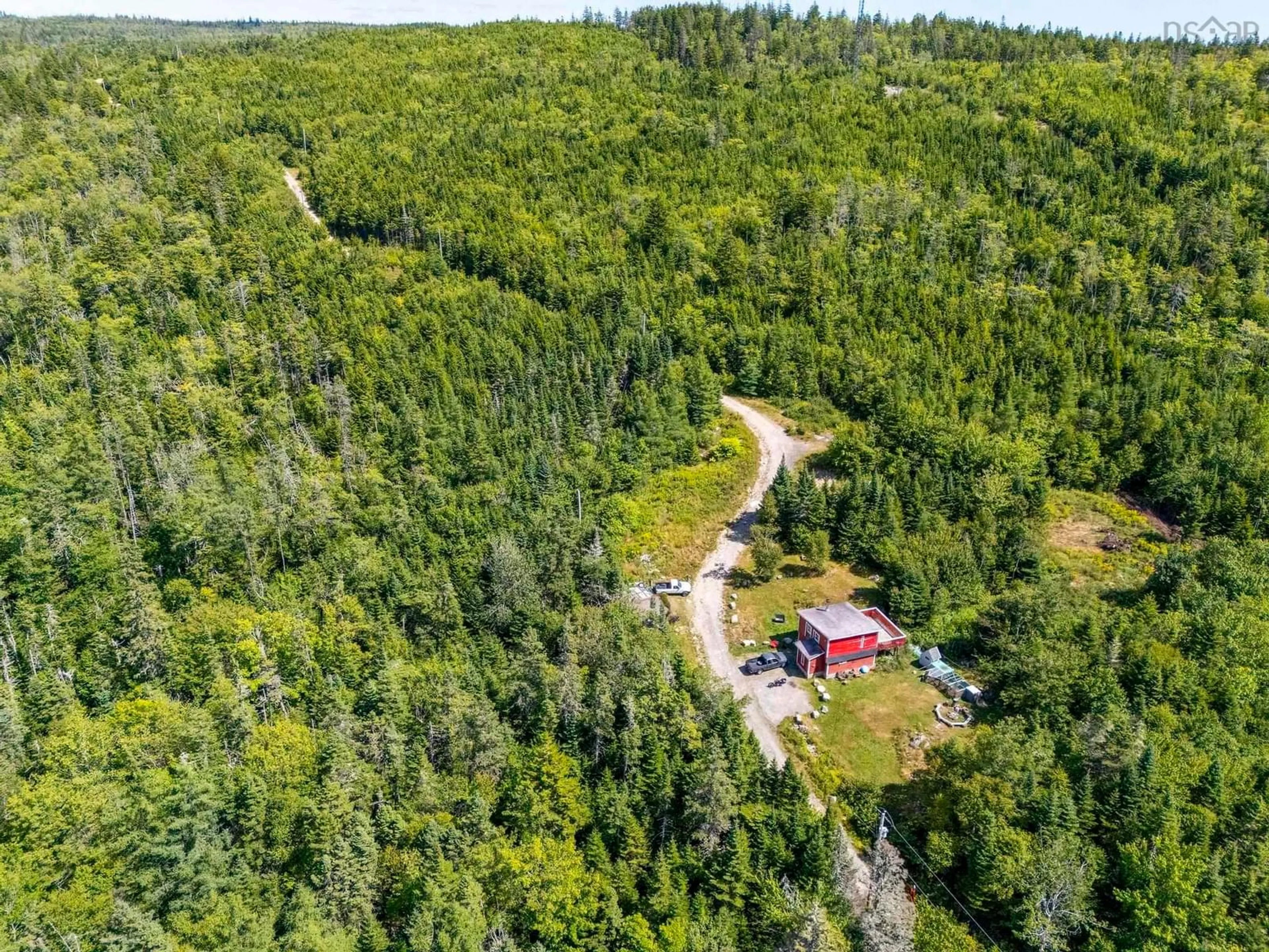 A pic from outside/outdoor area/front of a property/back of a property/a pic from drone, forest/trees view for 7635 St Margarets Bay Rd, Ingramport Nova Scotia B3Z 4A7