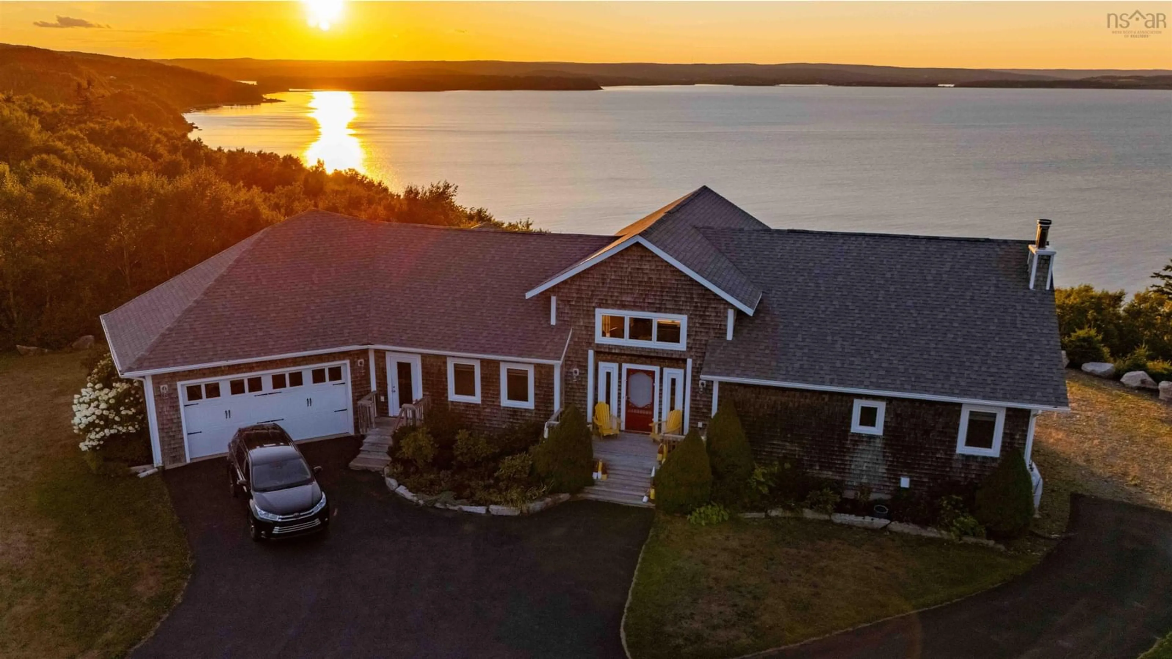 A pic from outside/outdoor area/front of a property/back of a property/a pic from drone, water/lake/river/ocean view for 8194 Highway 16, Dorts Cove Nova Scotia B0H 1N0