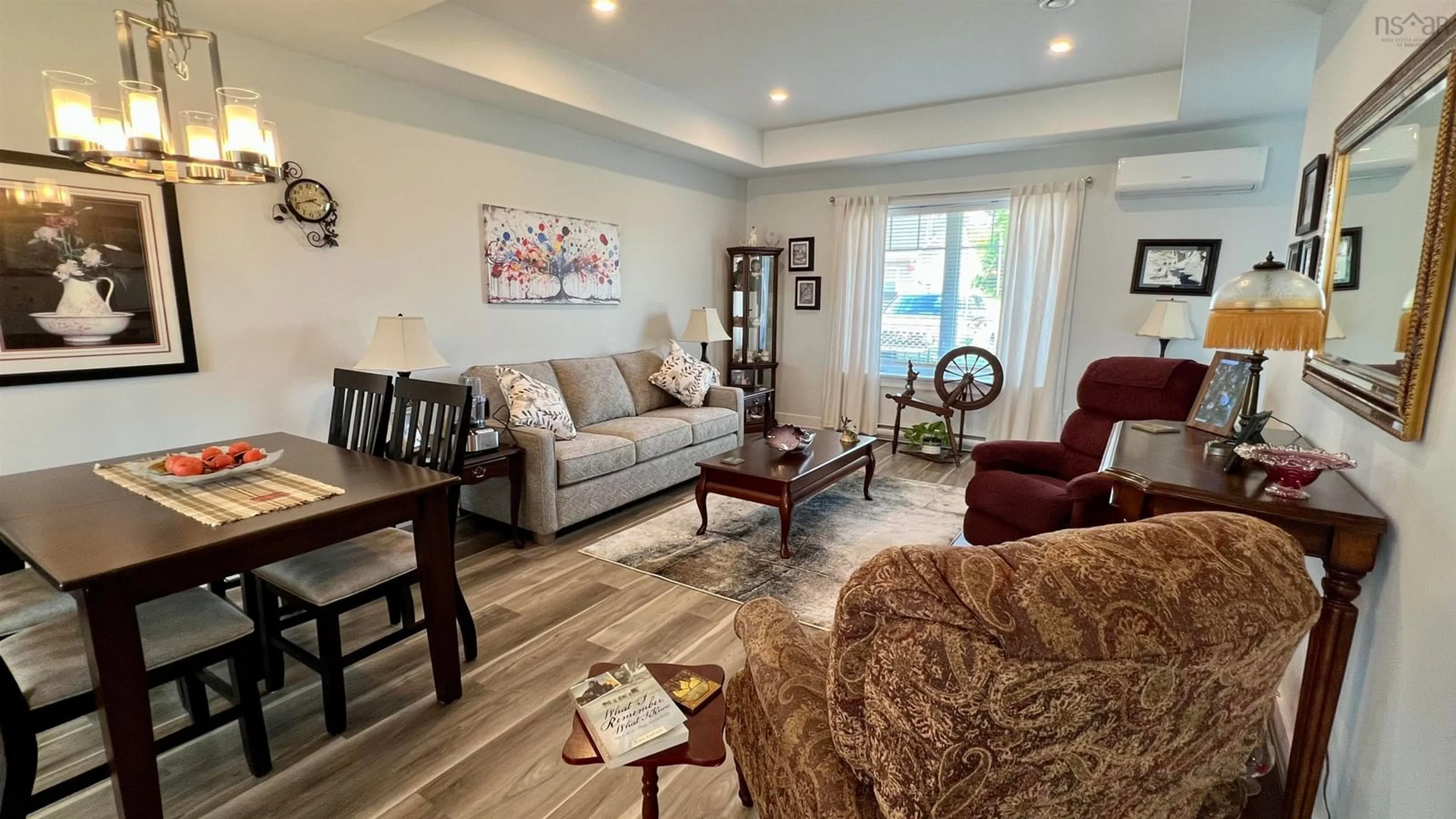 Living room with furniture, wood/laminate floor for UNIT 1 769 Pictou Rd, East Mountain Nova Scotia B6L 2M8