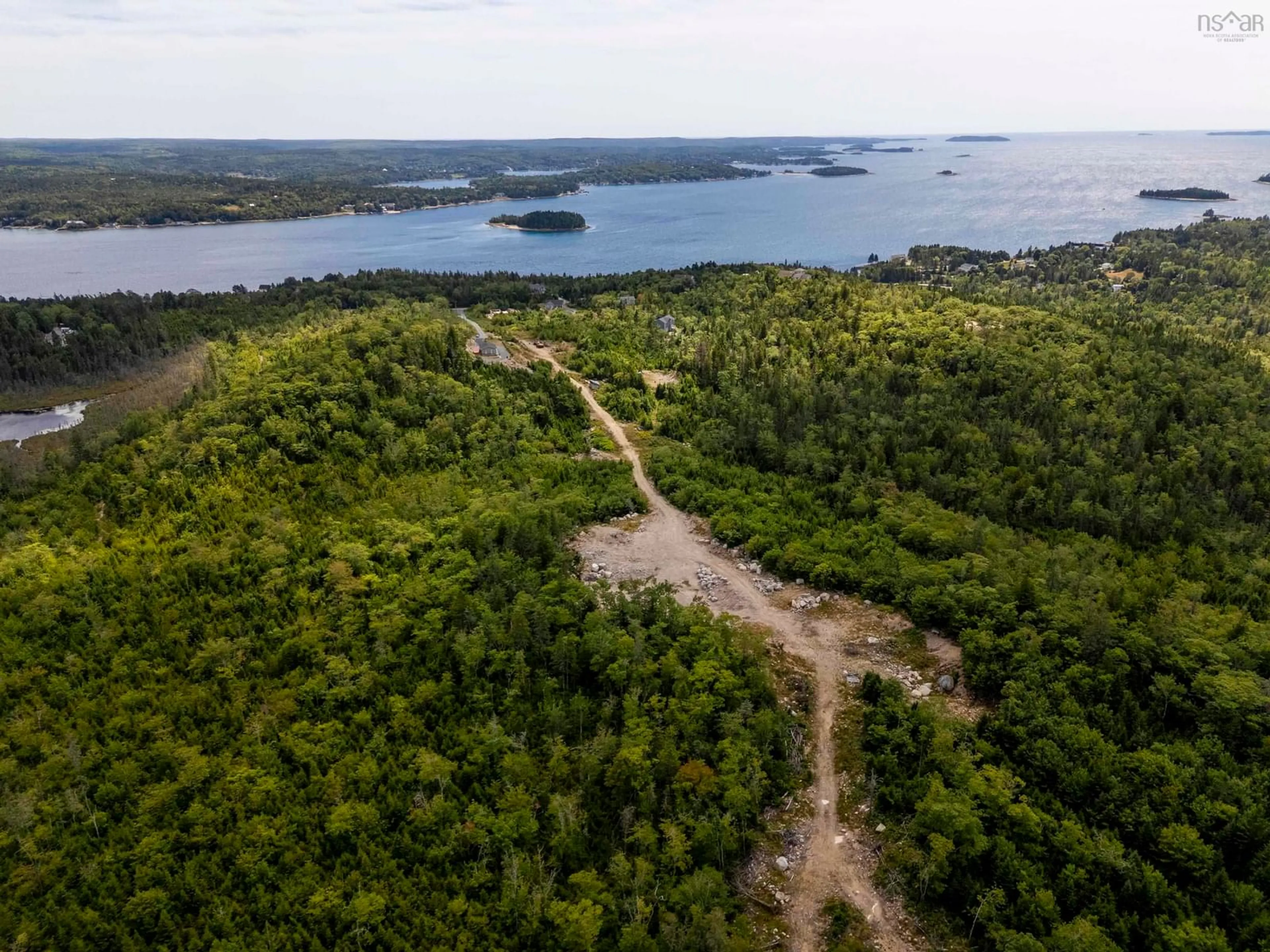 A pic from outside/outdoor area/front of a property/back of a property/a pic from drone, water/lake/river/ocean view for 166 Hillside Dr, Boutiliers Point Nova Scotia B3Z 1W8