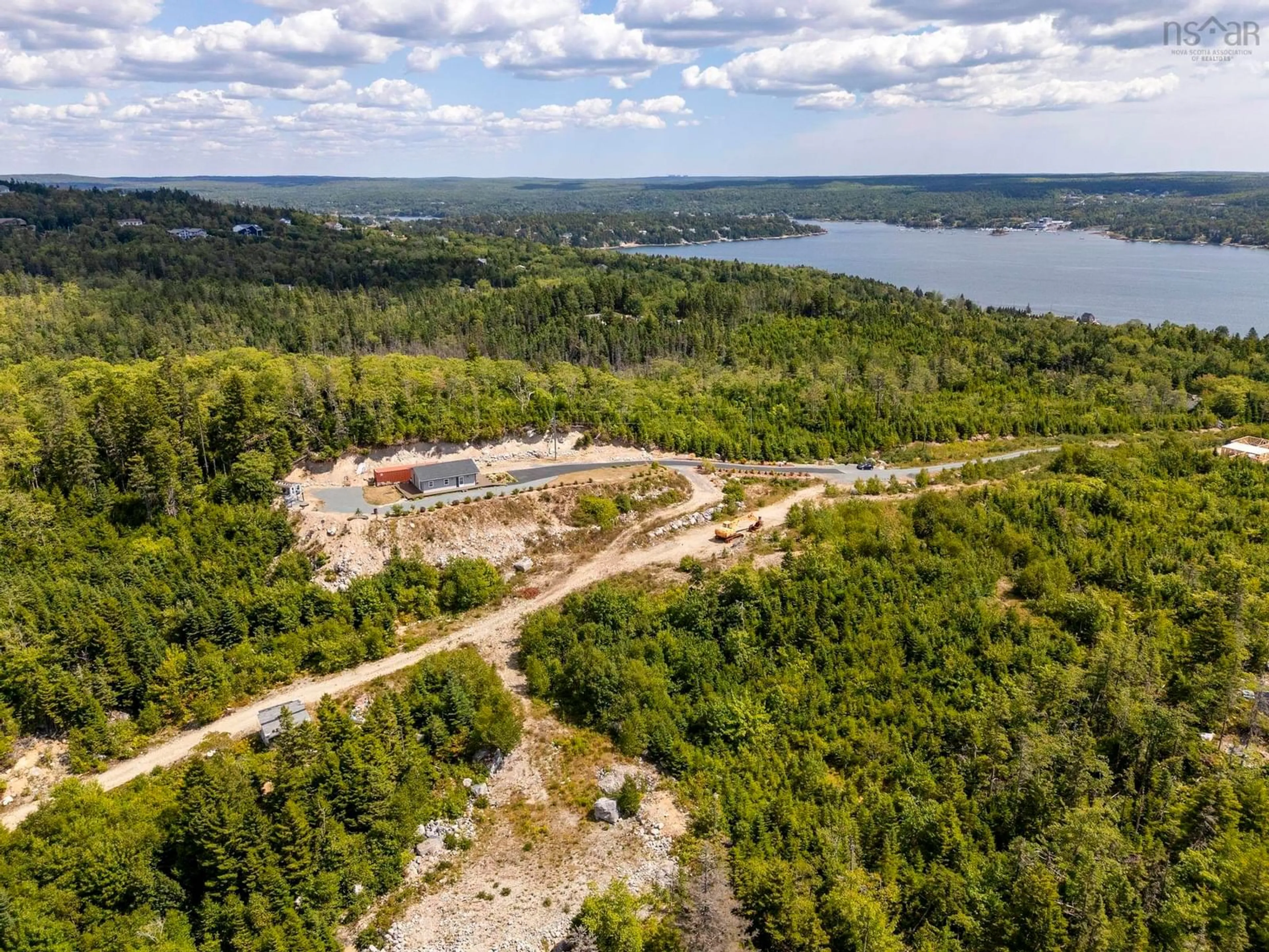 A pic from outside/outdoor area/front of a property/back of a property/a pic from drone, water/lake/river/ocean view for 166 Hillside Dr, Boutiliers Point Nova Scotia B3Z 1W8