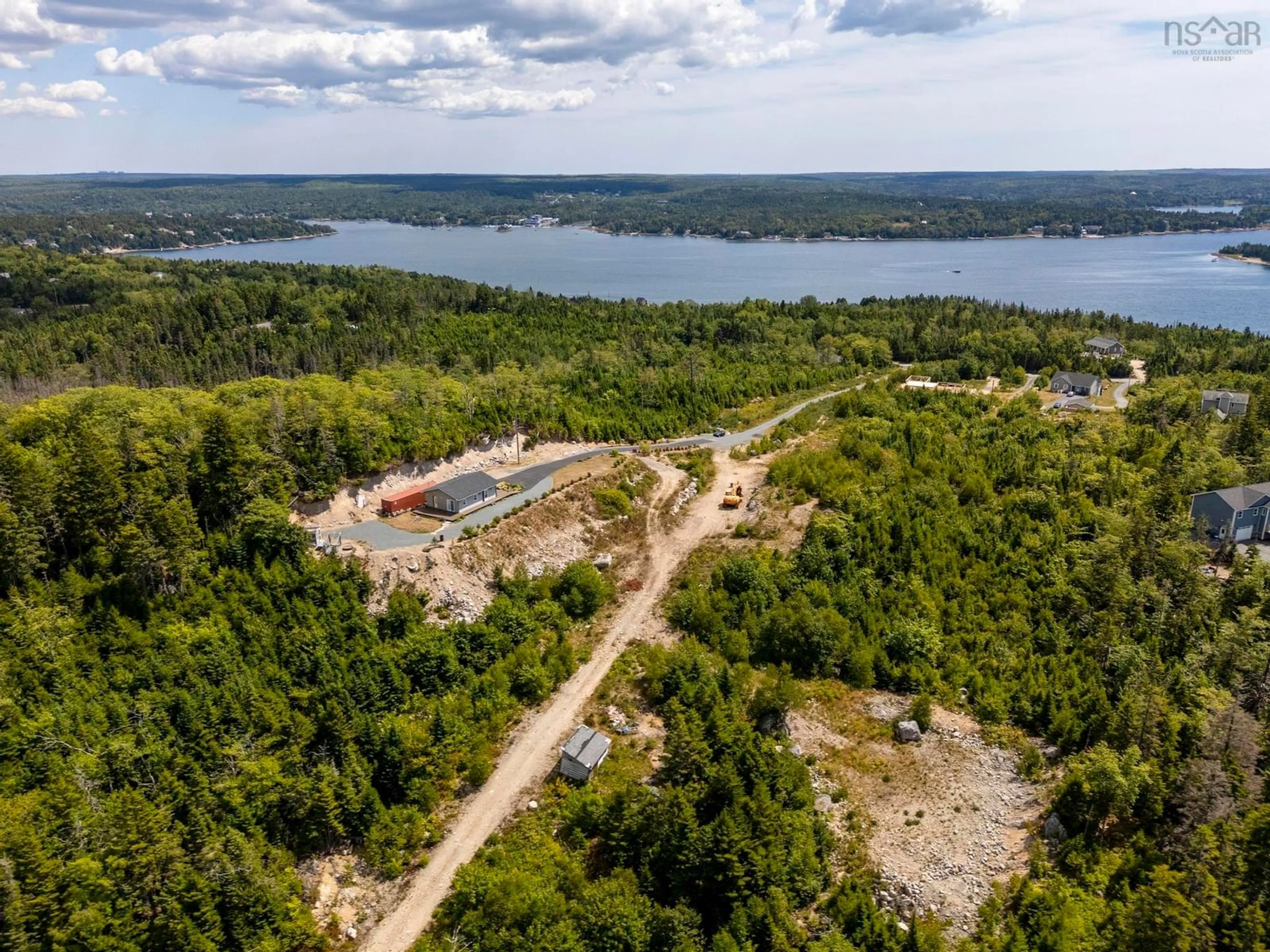 A pic from outside/outdoor area/front of a property/back of a property/a pic from drone, unknown for 166 Hillside Dr, Boutiliers Point Nova Scotia B3Z 1W8