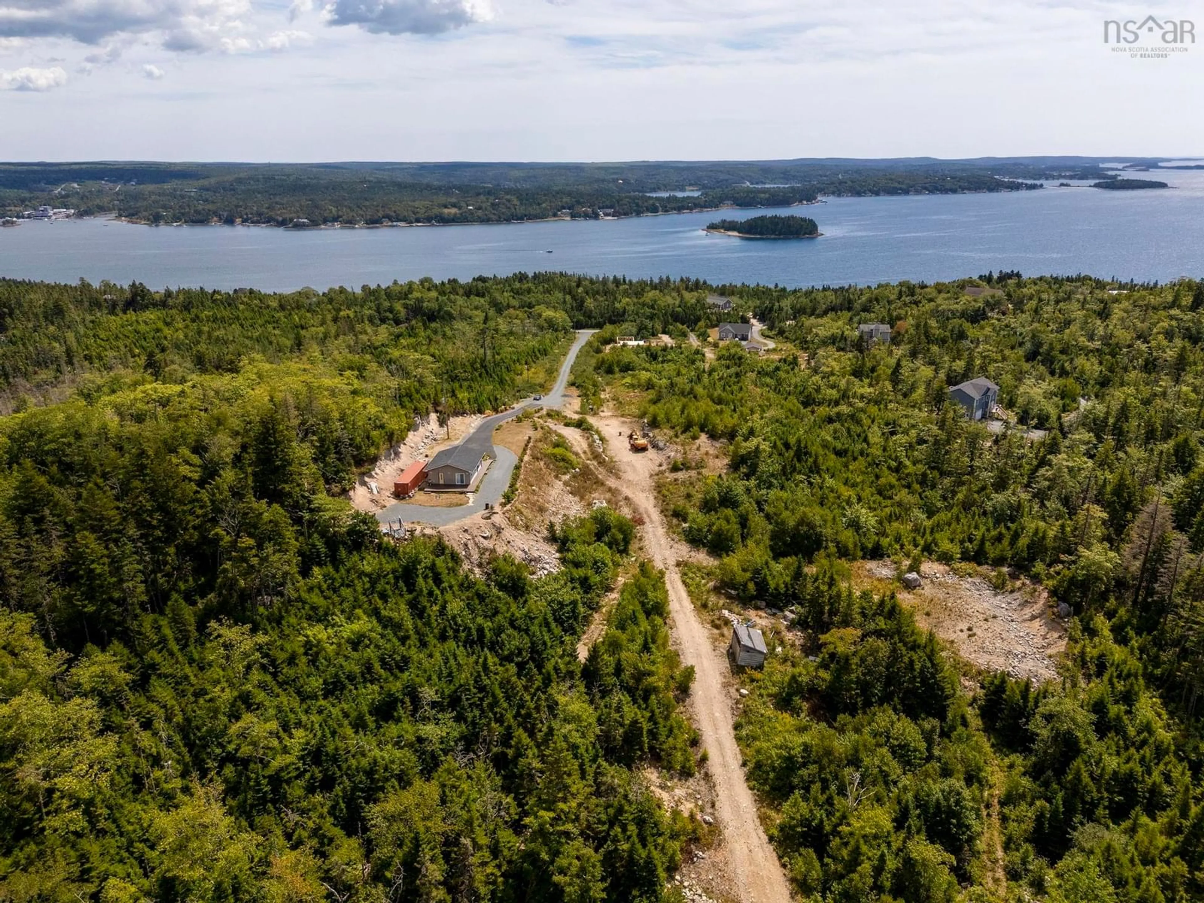 A pic from outside/outdoor area/front of a property/back of a property/a pic from drone, water/lake/river/ocean view for 166 Hillside Dr, Boutiliers Point Nova Scotia B3Z 1W8