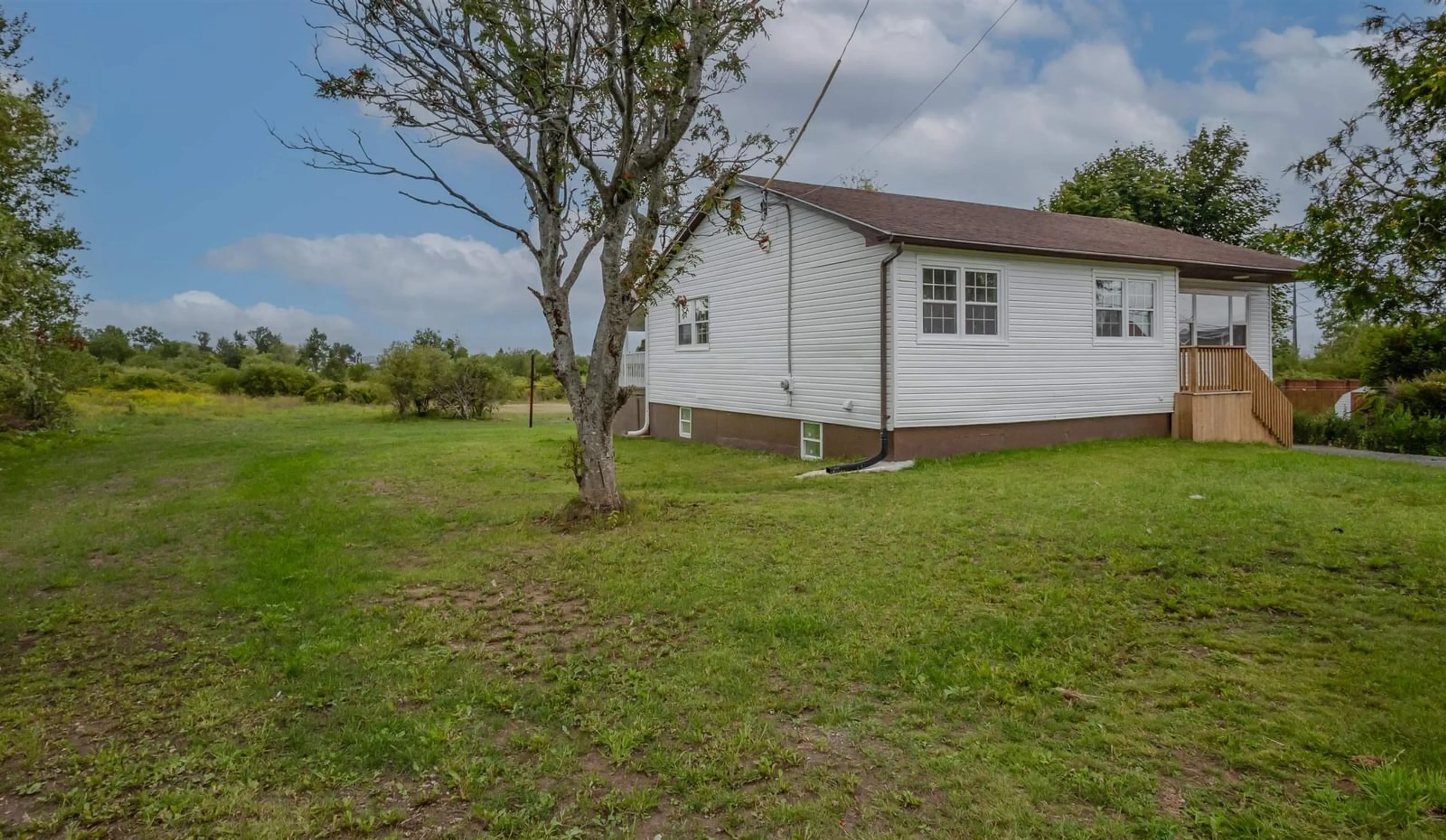A pic from outside/outdoor area/front of a property/back of a property/a pic from drone, water/lake/river/ocean view for 46 Catherine St, Sydney Nova Scotia B1N 2W1