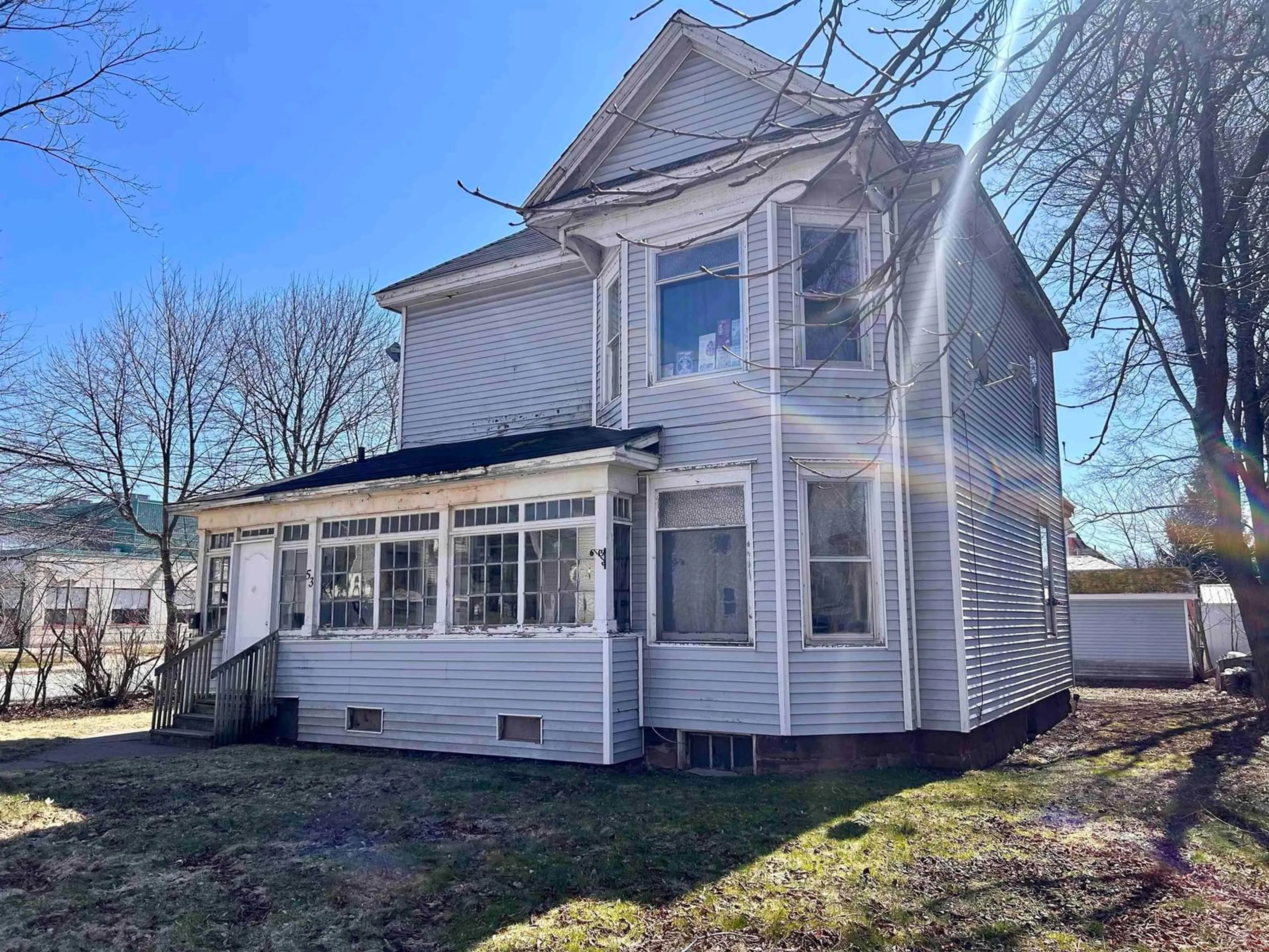 Home with vinyl exterior material, street for 53 Spring St, Amherst Nova Scotia B4H 1S3