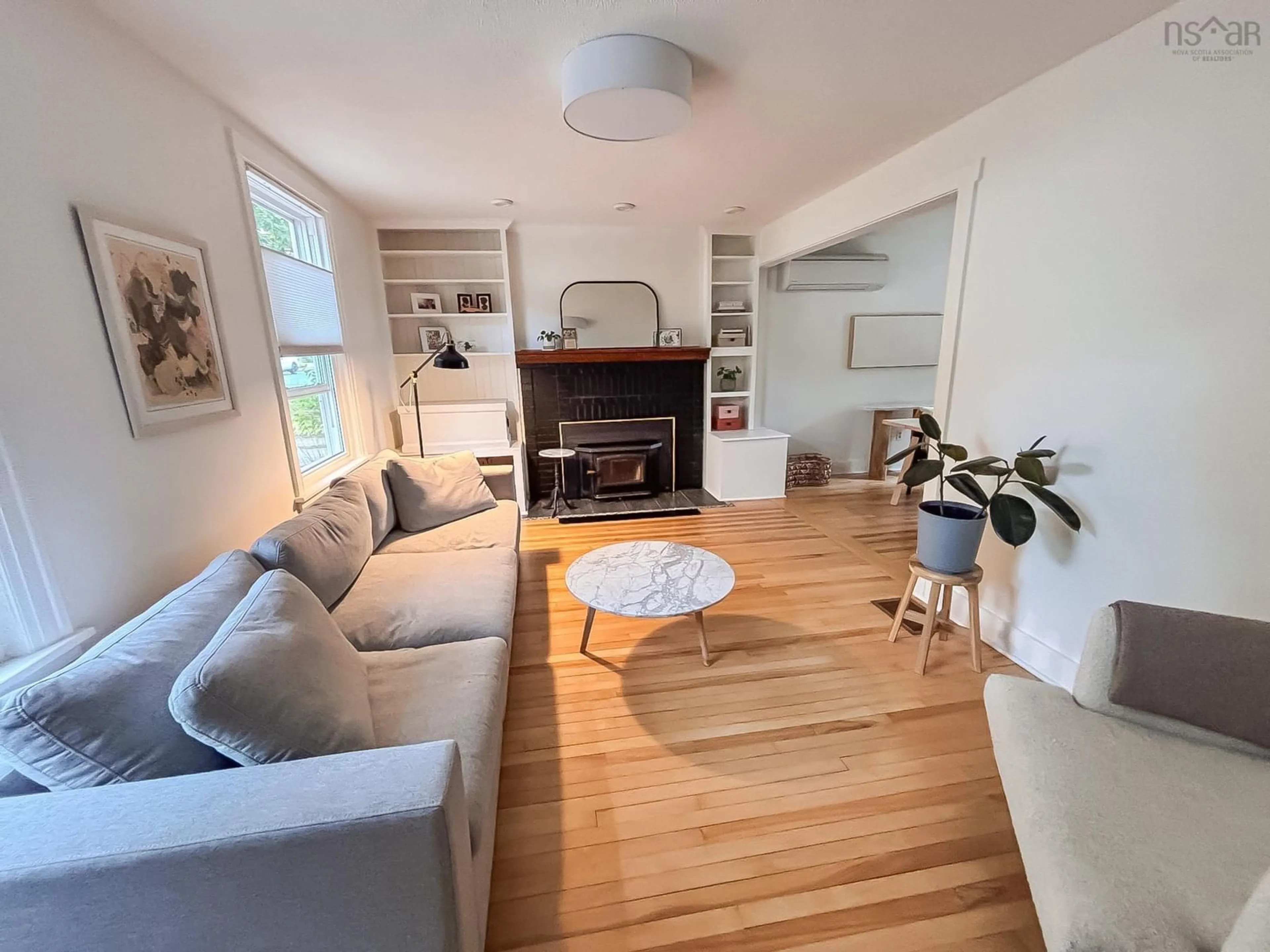 Living room with furniture, wood/laminate floor for 10 Dawson St, Bridgewater Nova Scotia B4V 1S6