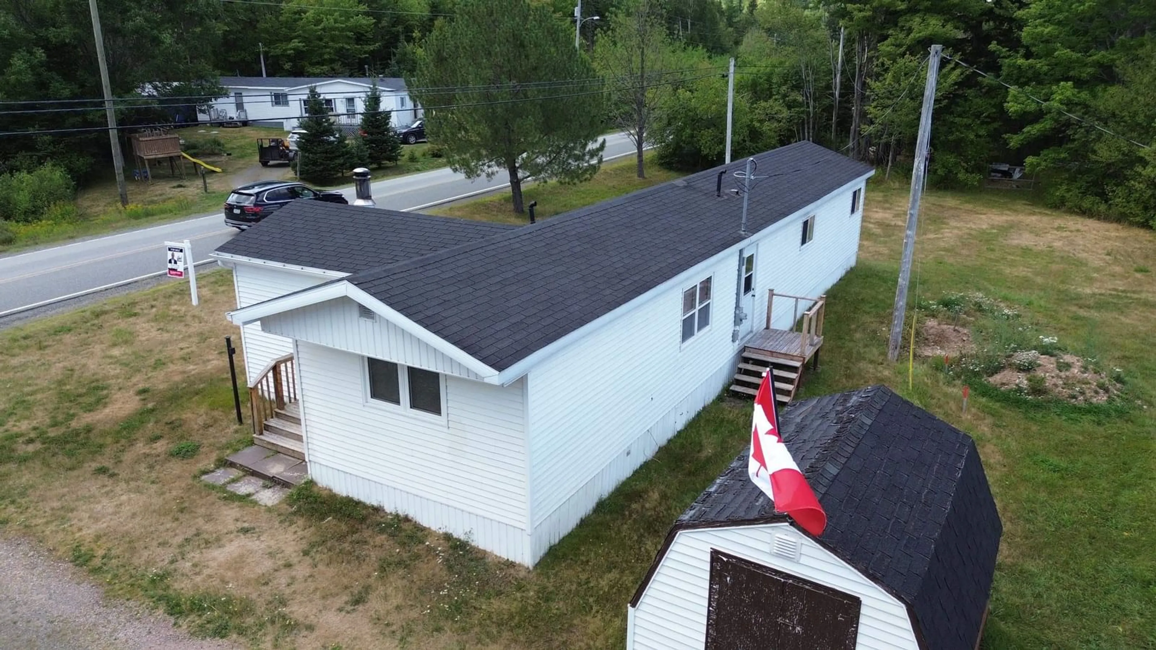 A pic from outside/outdoor area/front of a property/back of a property/a pic from drone, building for 810 Highway 252, Stewartdale Nova Scotia B0E 3M0