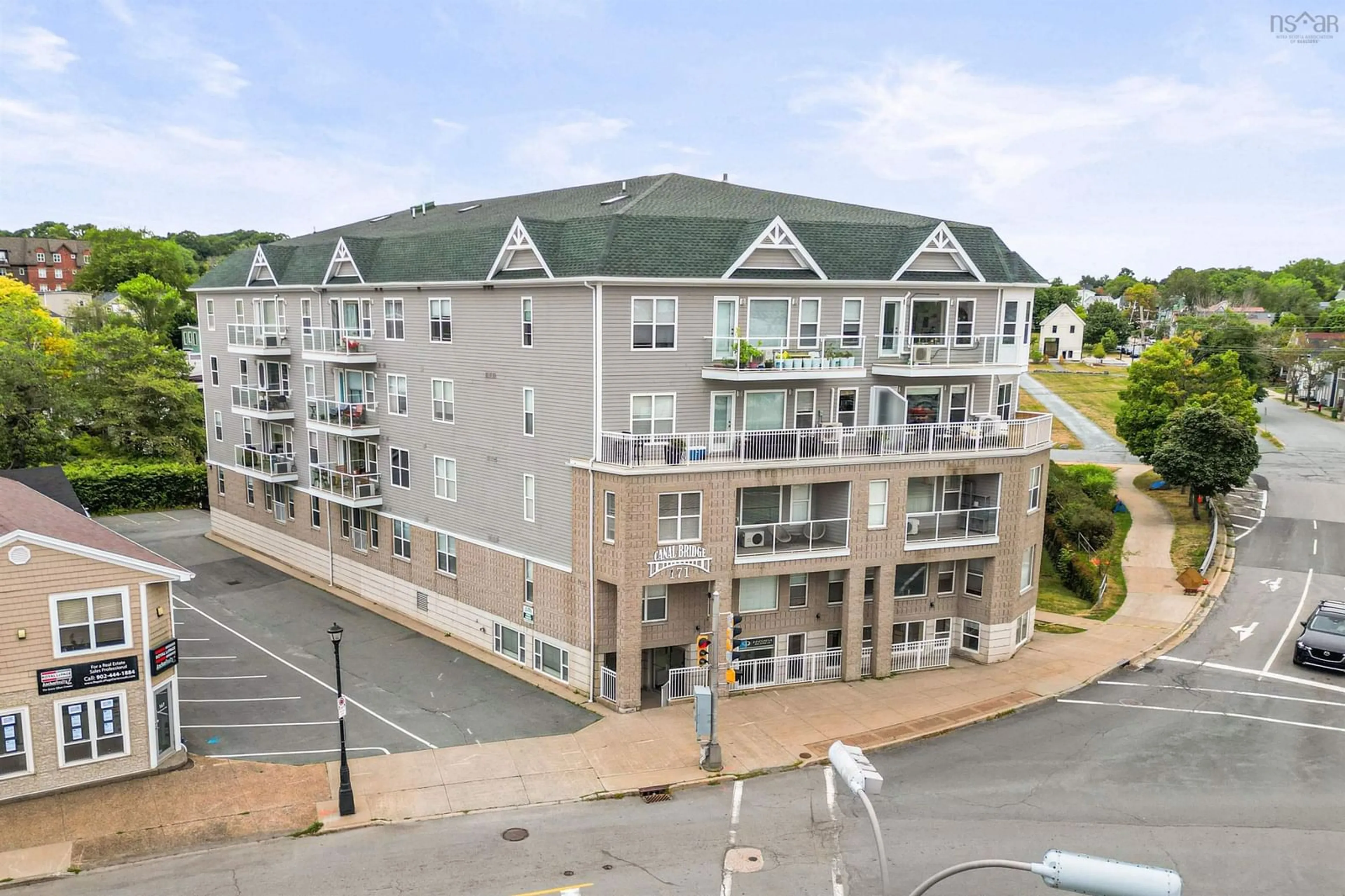 A pic from outside/outdoor area/front of a property/back of a property/a pic from drone, unknown for 306-171 Portland St, Dartmouth Nova Scotia B2Y 4X2