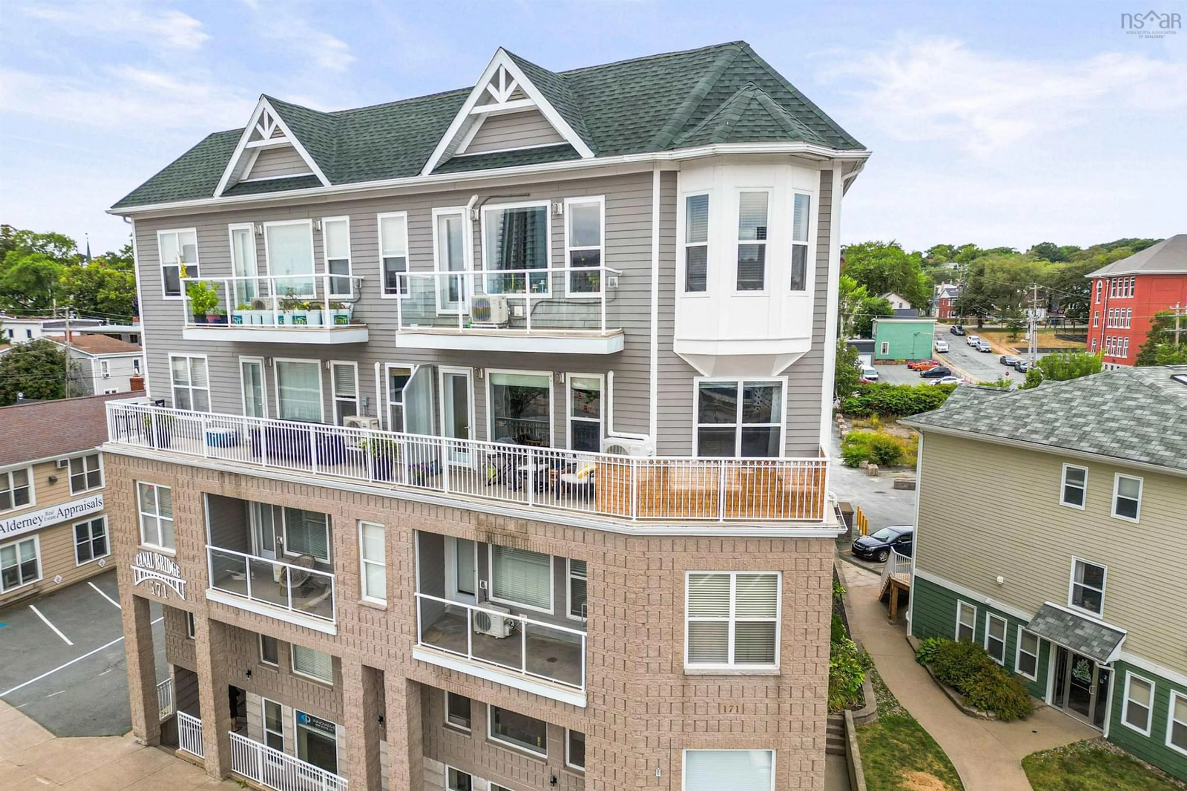 A pic from outside/outdoor area/front of a property/back of a property/a pic from drone, city buildings view from balcony for 306-171 Portland St, Dartmouth Nova Scotia B2Y 4X2