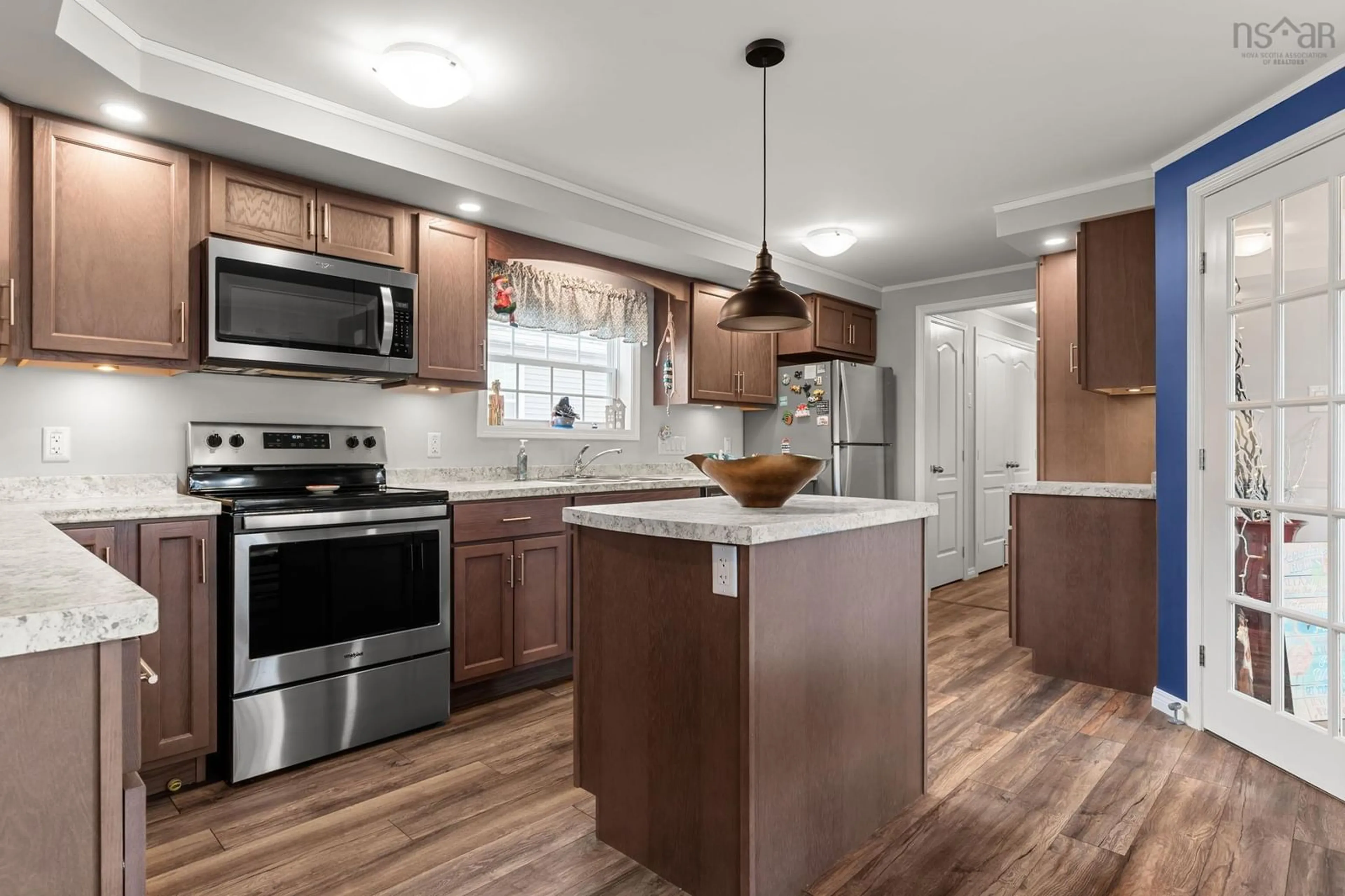 Open concept kitchen, wood/laminate floor for 35 Eighth St, Lucasville Nova Scotia B4B 1R5