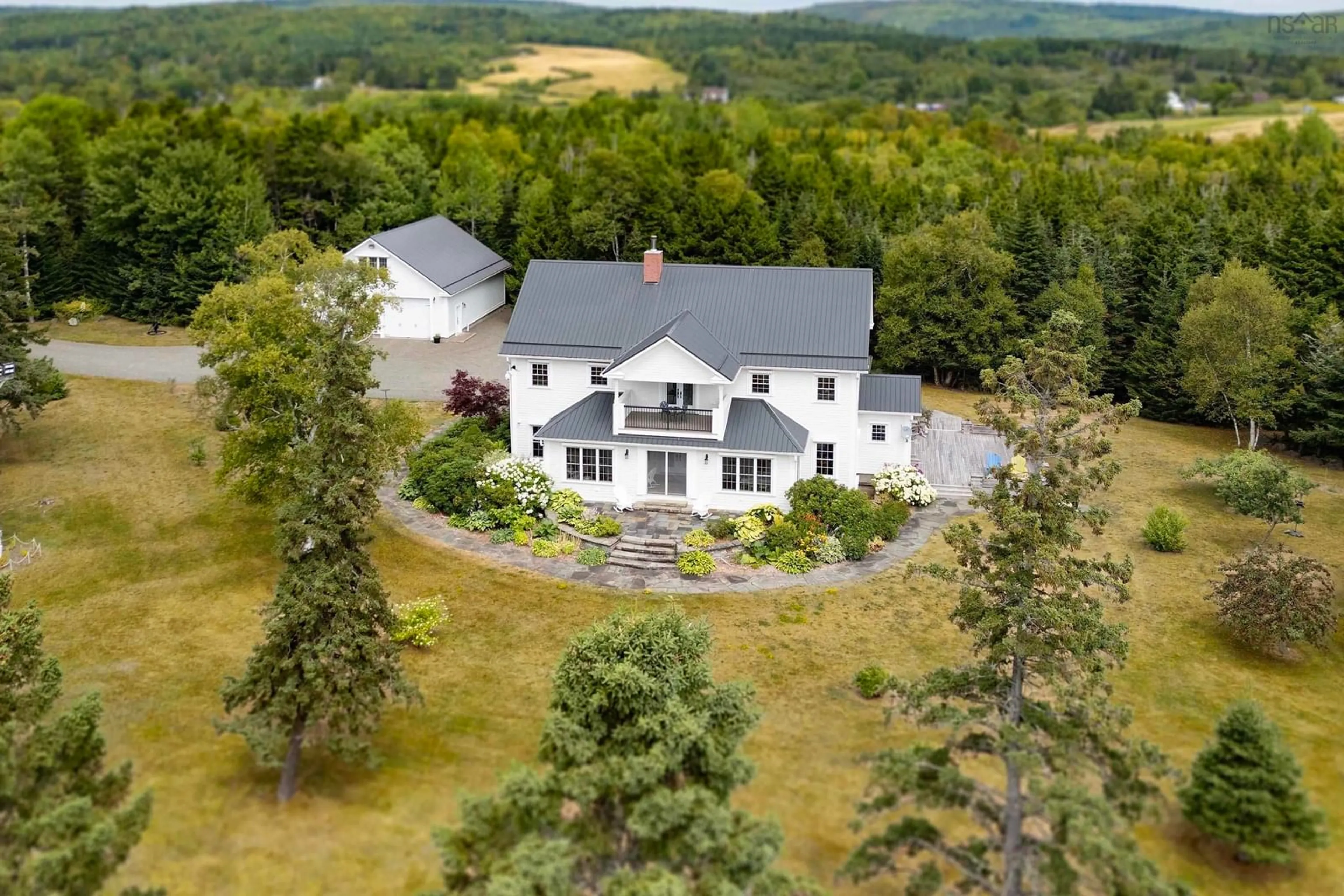 A pic from outside/outdoor area/front of a property/back of a property/a pic from drone, mountain view for 101 Phillip Fulmore Rd, Lower Five Islands Nova Scotia B0M 1N0