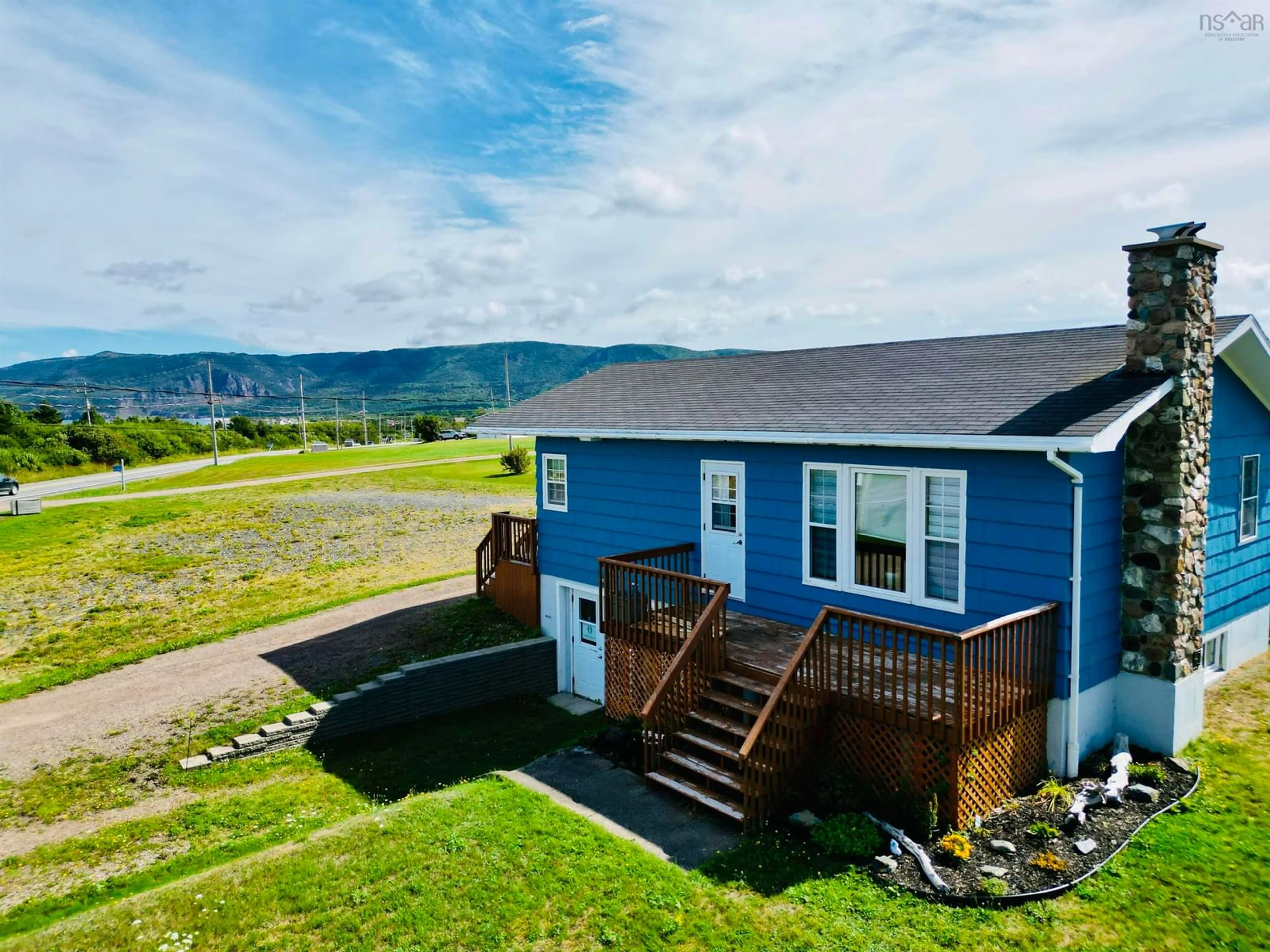A pic from outside/outdoor area/front of a property/back of a property/a pic from drone, water/lake/river/ocean view for 15776 Cabot Trail Rd, Chéticamp Nova Scotia B0E 1H0